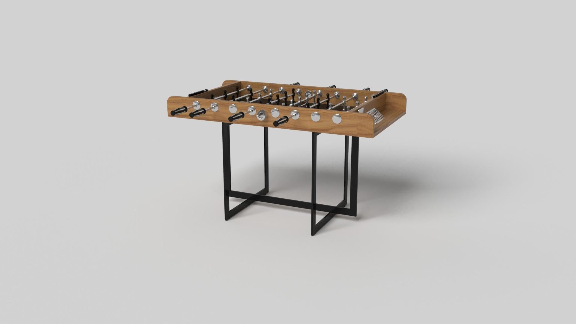 With an open metal foundation, our Beso table is a unique expression of contemporary forms and negative space. This foosball table is handcrafted by our master artisans with a rectangle-in-rectangle base that echoes the angles and edges of a