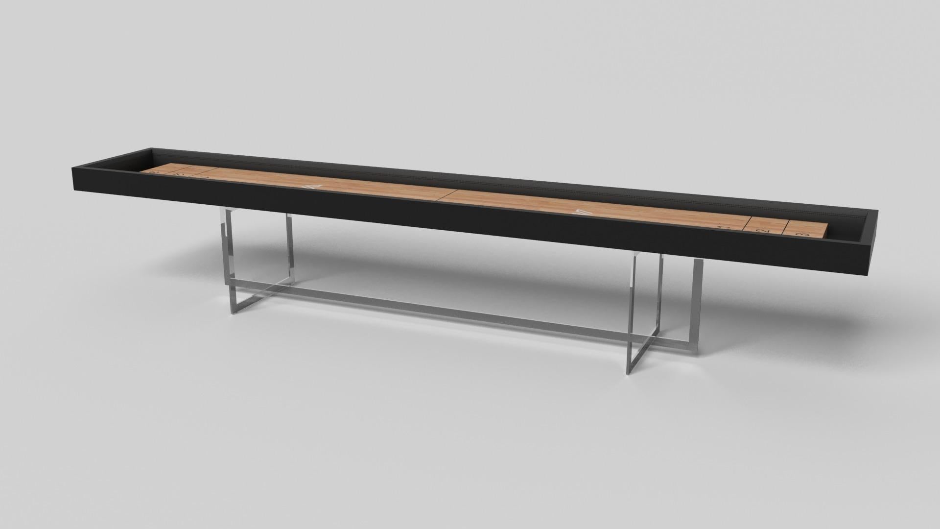 With an open metal foundation, our Beso table is a unique expression of contemporary forms and negative space. This shuffleboard table is handcrafted by our master artisans with a rectangle-in-rectangle base that echoes the angles and edges of a