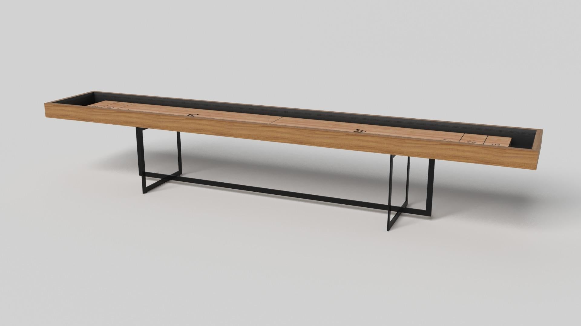 With an open metal foundation, our Beso table is a unique expression of contemporary forms and negative space. This shuffleboard table is handcrafted by our master artisans with a rectangle-in-rectangle base that echoes the angles and edges of a