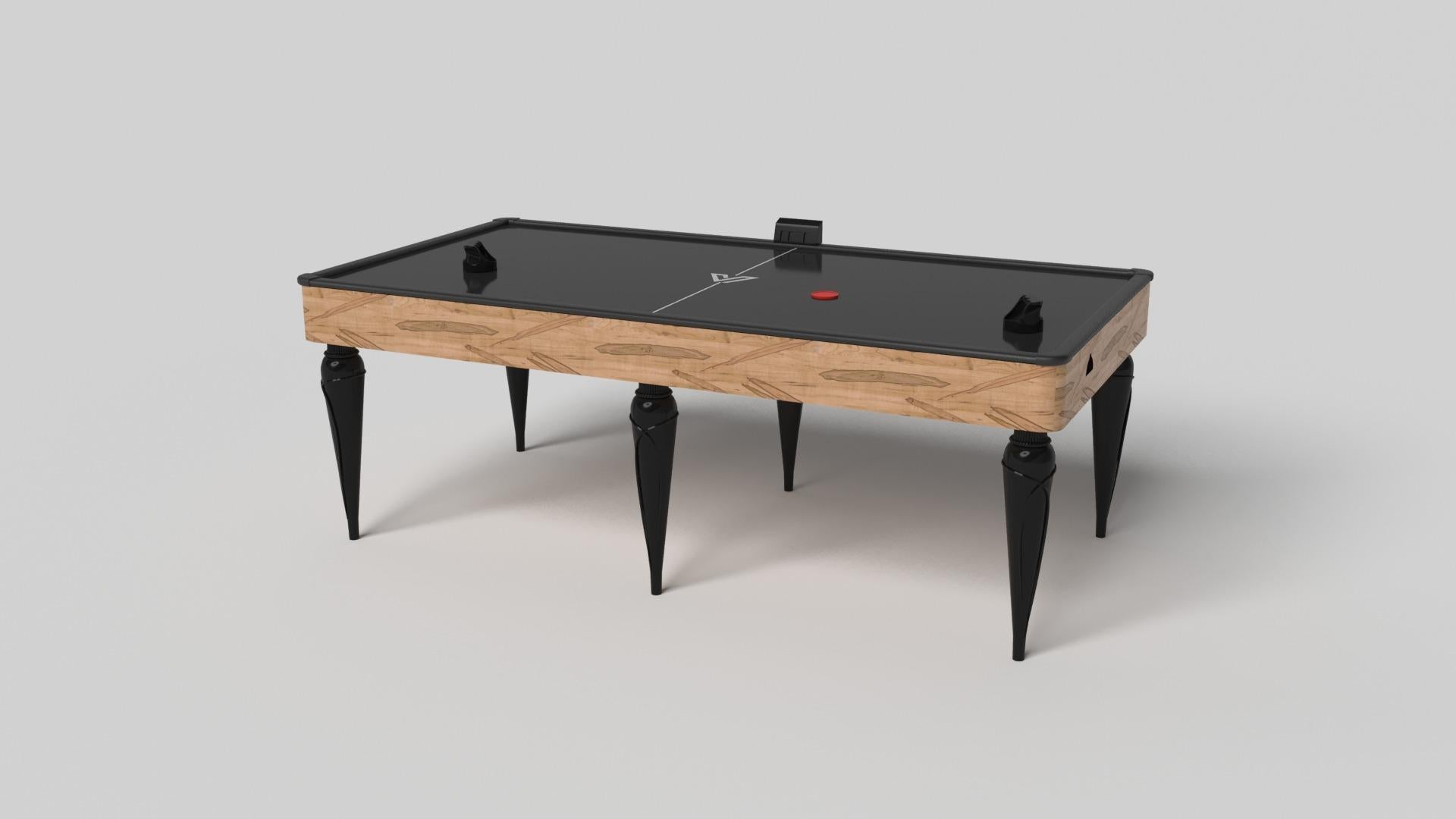 Champagne gold accents add undeniable elegance to this luxury air hockey table. Offering superior playability and uncompromised style, this design features hand carved details, decorative metal elements, and metal sabots at the bottom of each leg.