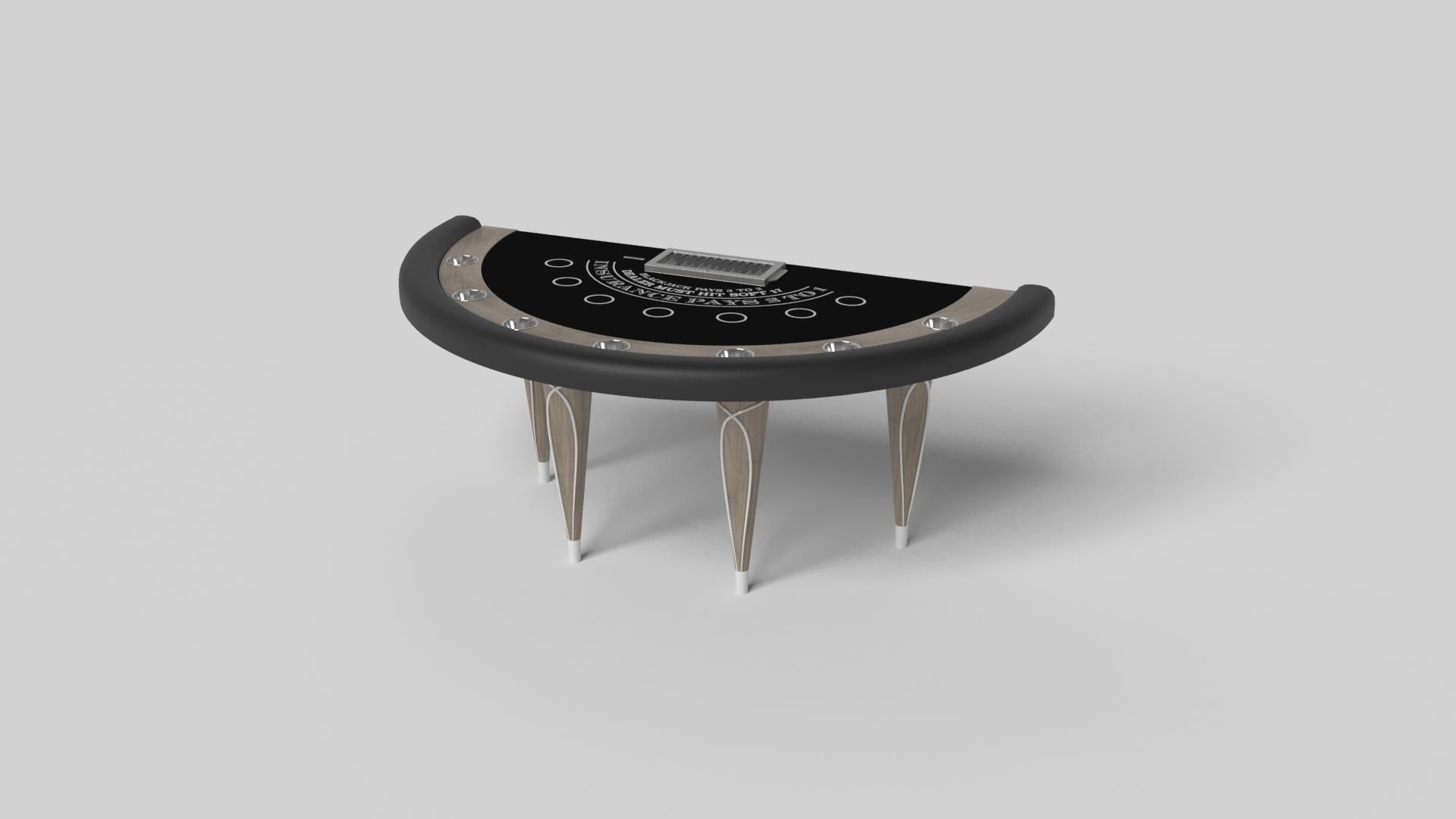 Champagne gold accents add undeniable elegance to this luxury blackjack table. Offering superior playability and uncompromised style, this design features hand carved details, decorative metal elements, and metal sabots at the bottom of each leg.