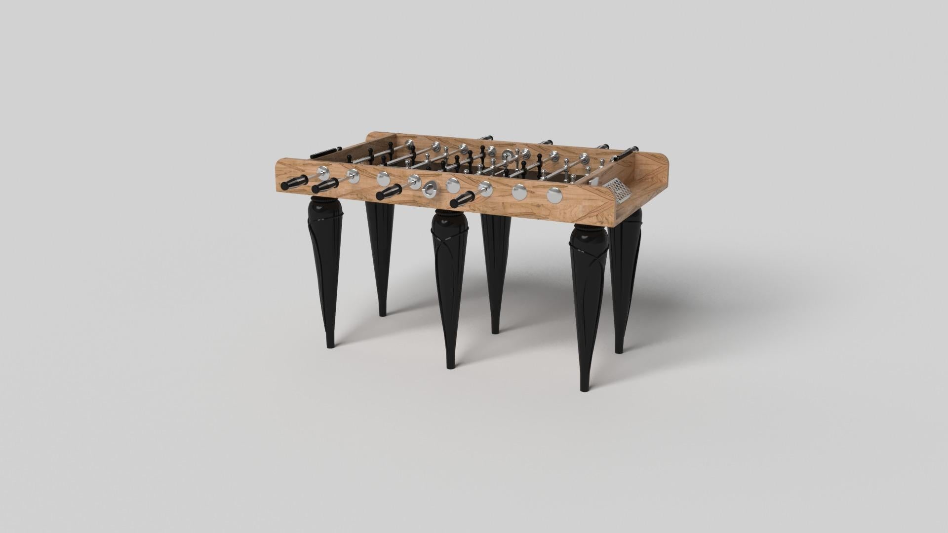 Champagne gold accents add undeniable elegance to this luxury foosball table. Offering superior playability and uncompromised style, this design features hand carved details, decorative metal elements, and metal sabots at the bottom of each leg. The