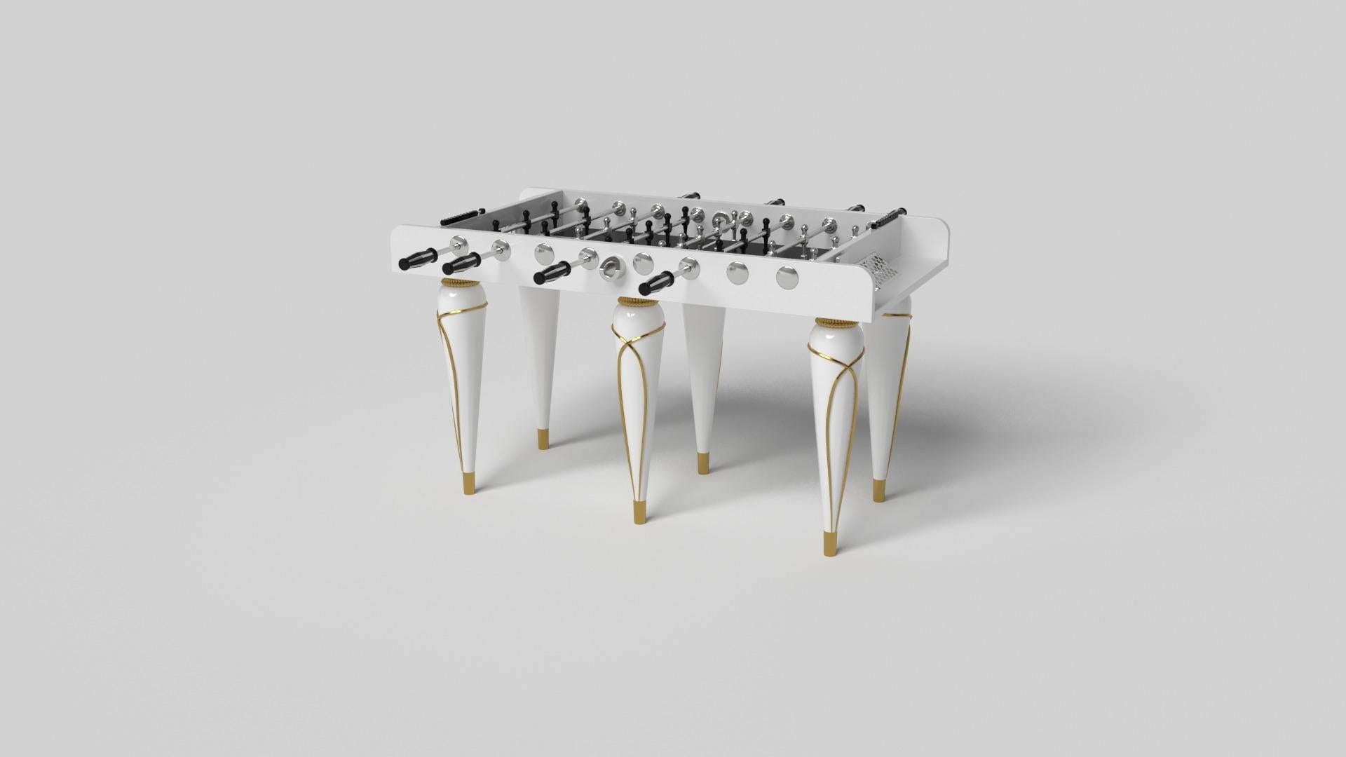 Champagne gold accents add undeniable elegance to this luxury foosball table. Offering superior playability and uncompromised style, this design features hand carved details, decorative metal elements, and metal sabots at the bottom of each leg. The