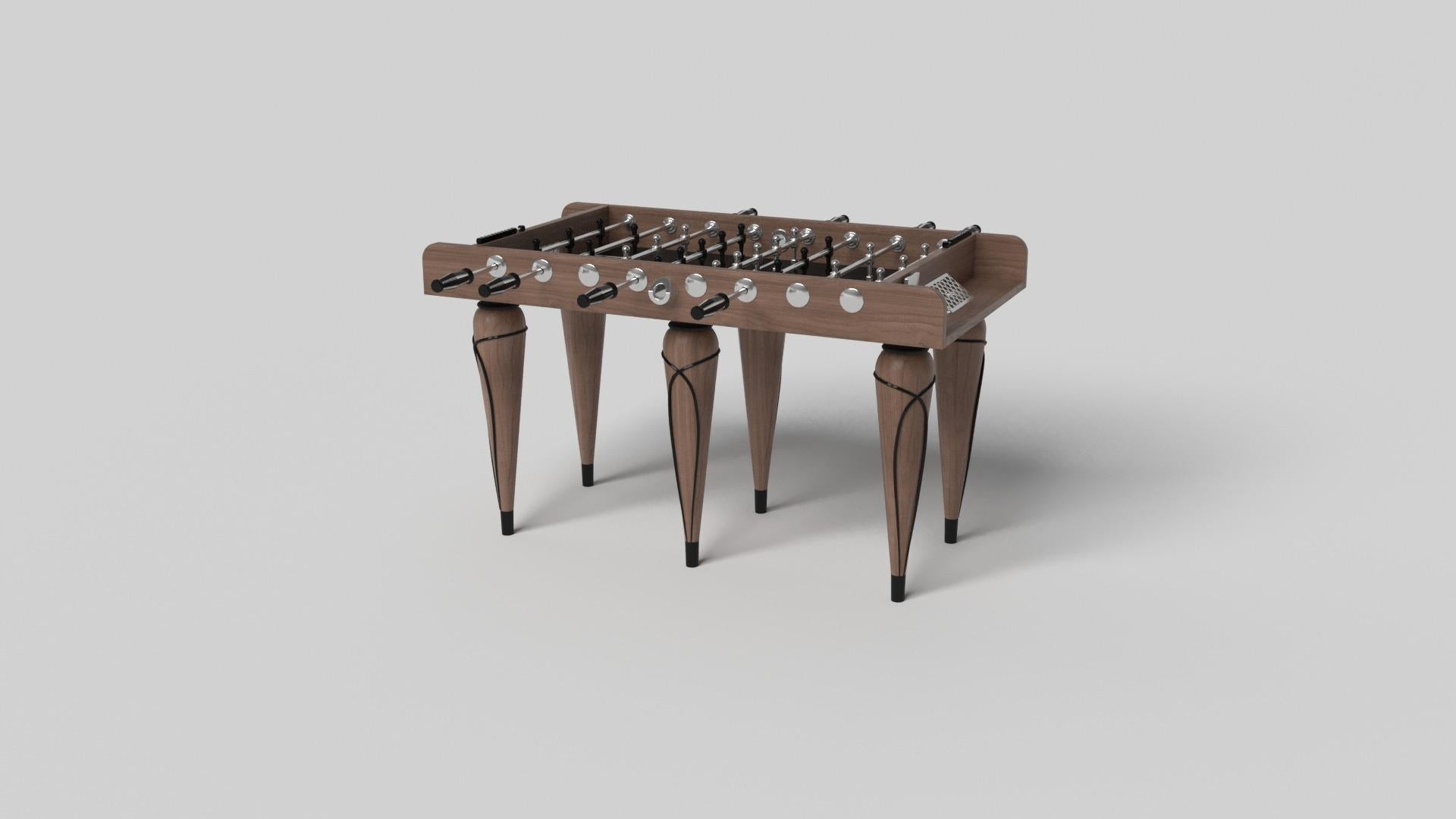 Champagne gold accents add undeniable elegance to this luxury foosball table. Offering superior playability and uncompromised style, this design features hand carved details, decorative metal elements, and metal sabots at the bottom of each leg. The