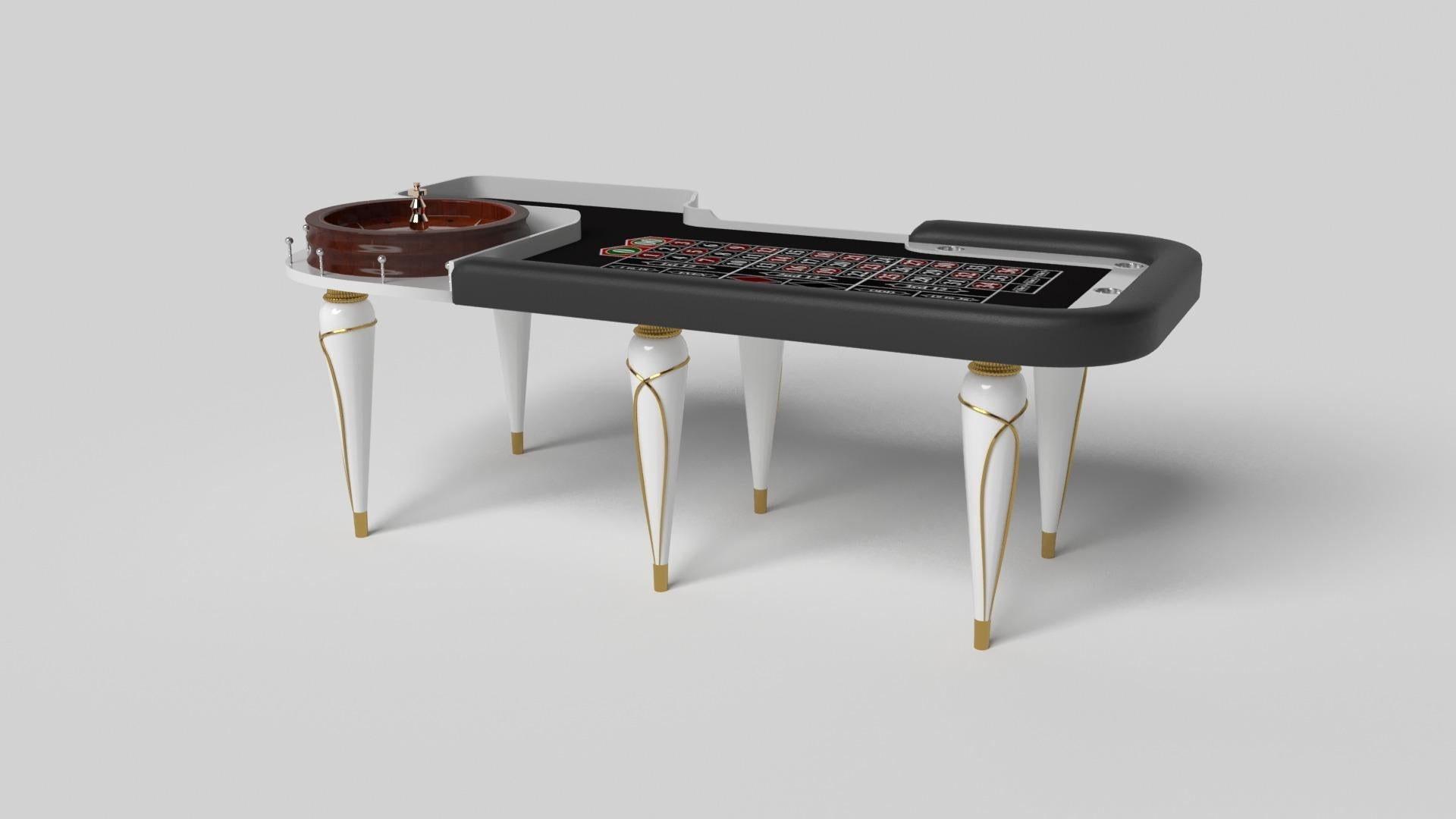 Champagne gold accents add undeniable elegance to this luxury roulette table. Offering superior playability and uncompromised style, this design features hand carved details, decorative metal elements, and metal sabots at the bottom of each leg. The