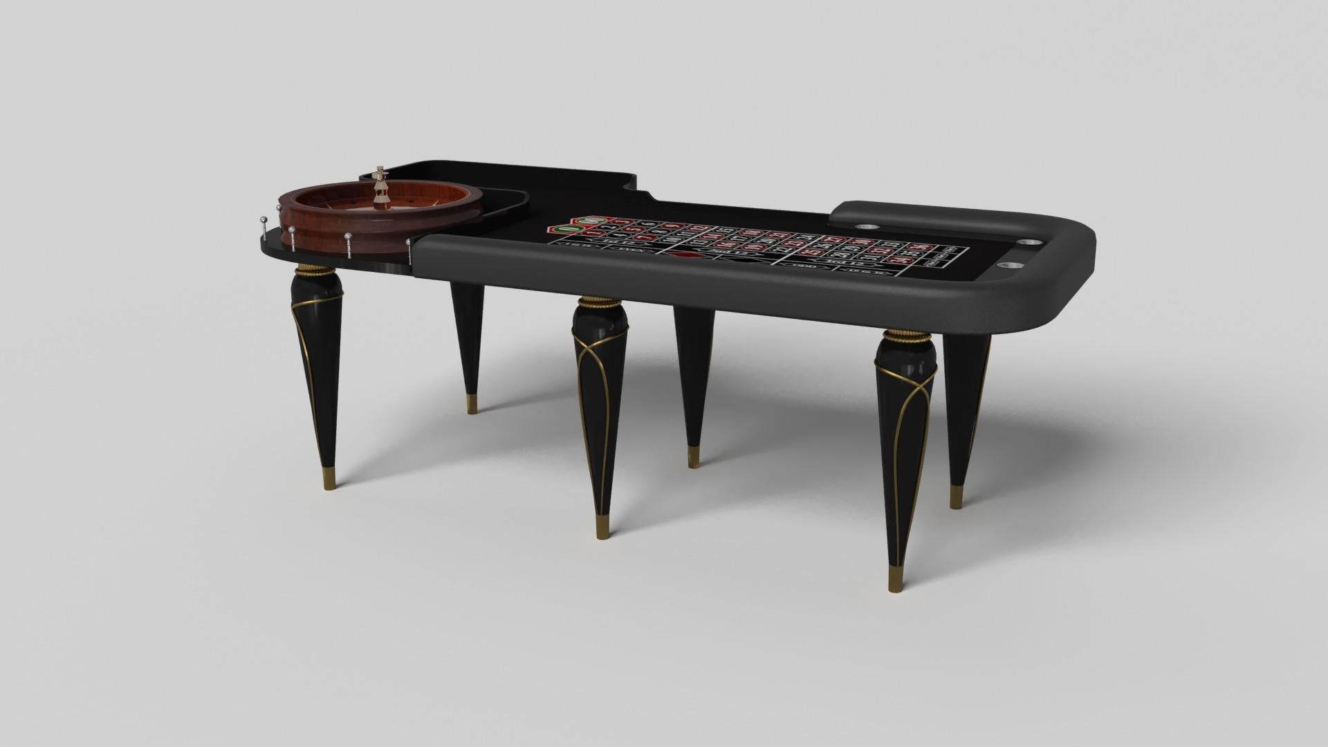 Champagne gold accents add undeniable elegance to this luxury roulette table. Offering superior playability and uncompromised style, this design features hand carved details, decorative metal elements, and metal sabots at the bottom of each leg. The