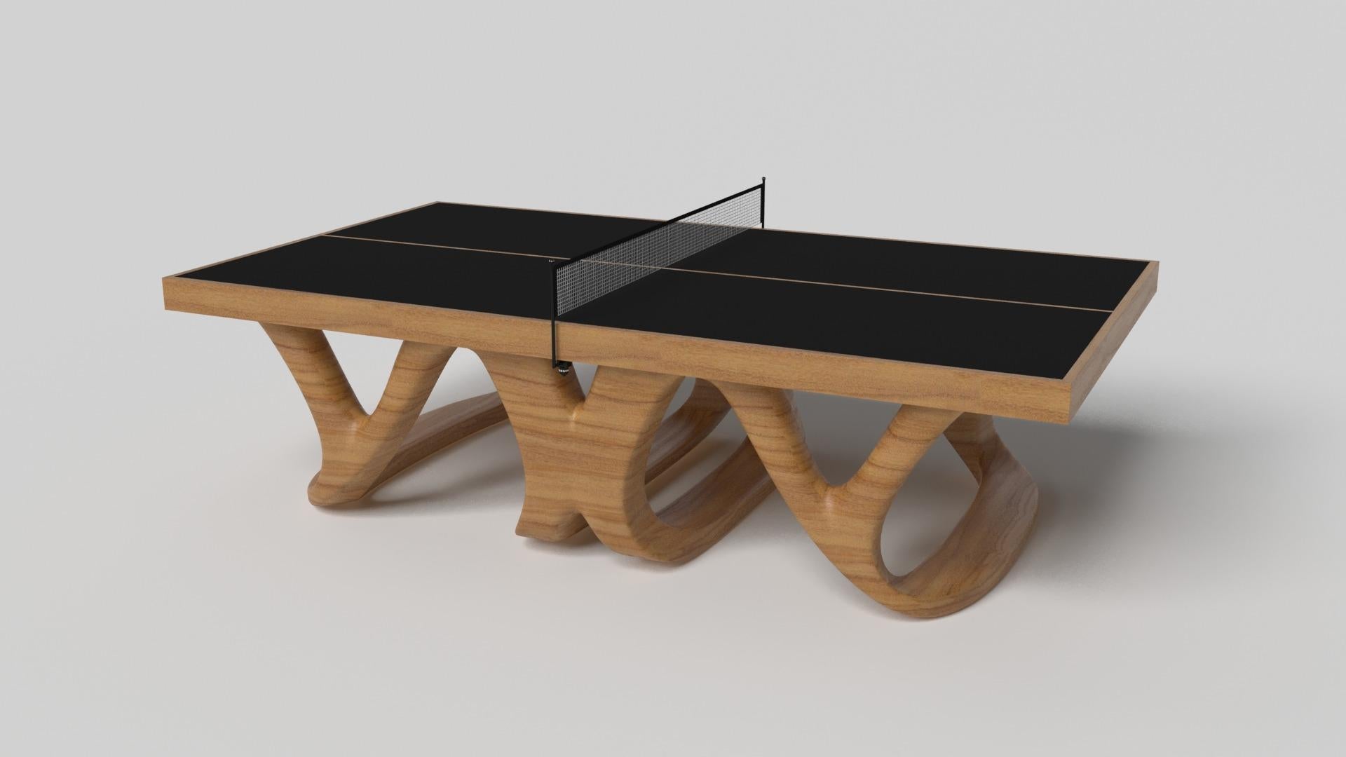 Inspirada en la obra de Antoni Gaudí y en el movimiento del Modernismo catalán, la mesa de ping-pong Draco de nogal presume de un estilo atrevido con patas suaves y curvadas y un tablero negro nítido con una red de ping-pong estándar para un juego