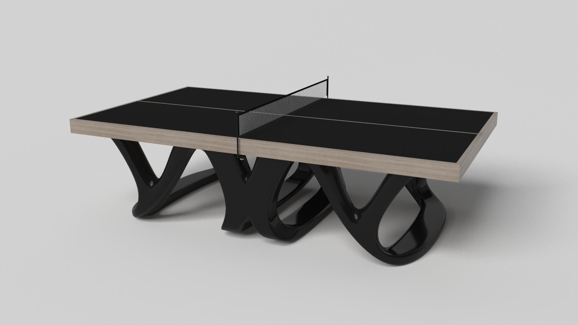 Inspirada en la obra de Antoni Gaudí y en el movimiento del Modernismo catalán, la mesa de ping-pong Draco de nogal presume de un estilo atrevido con patas suaves y curvadas y un tablero negro nítido con una red de ping-pong estándar para un juego