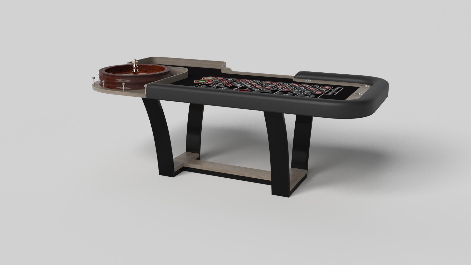 Avec une base en métal en forme de I, des pieds en métal légèrement inclinés et un plateau en bois contrasté, la table de roulette Elite dégage une sophistication moderne tout en évoquant un sens du design art déco. Cette table est une confluence de