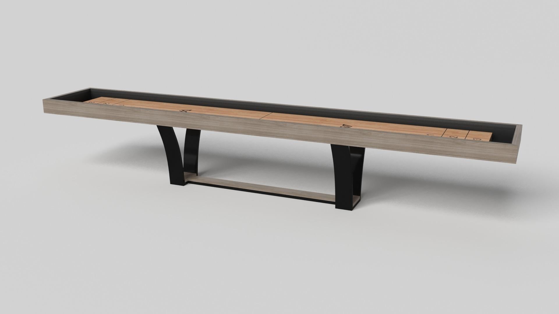 With an I-shaped metal base, slightly sloped metal legs, and a contrasting wood top, the Elite shuffleboard table exudes modern sophistication while evoking a sense of art deco design. This table is a confluence of style, made to meet today's