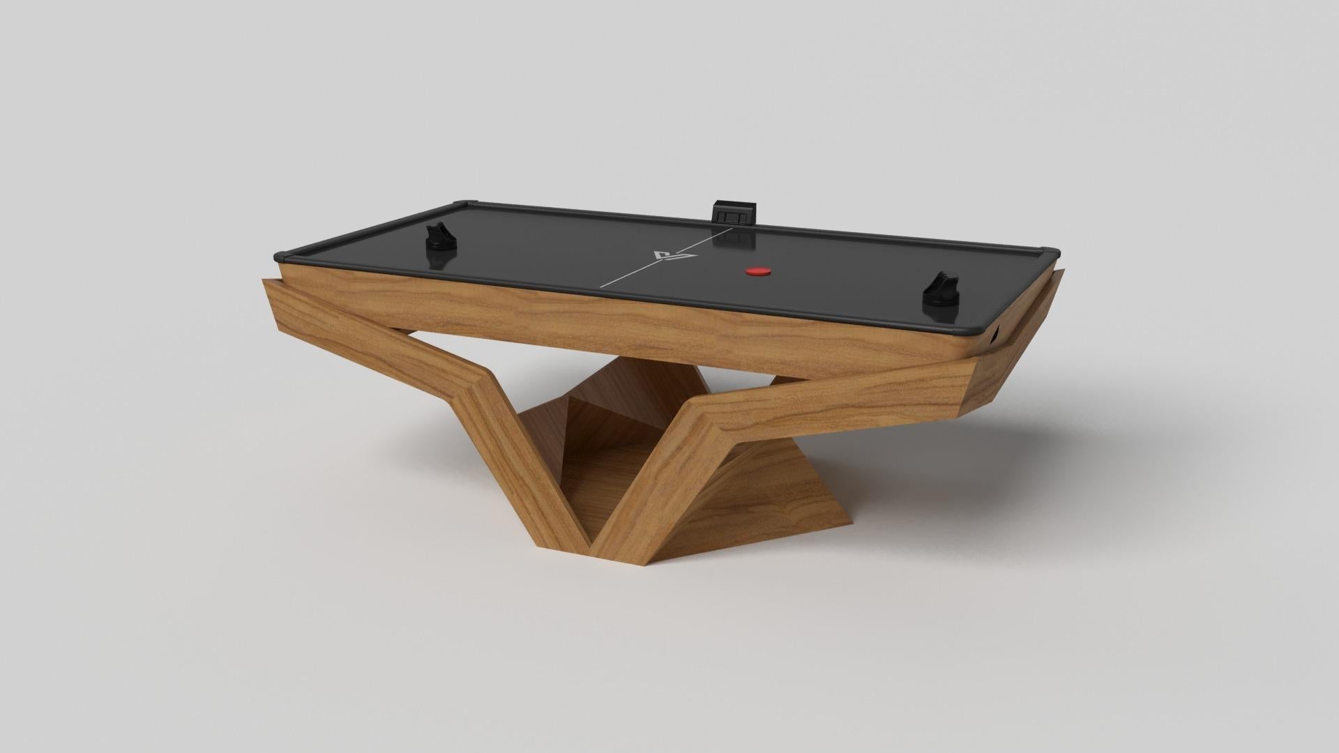 The Enzo air hockey table is Inspired by the aerodynamic angles of top-of-the-line European vehicles. Designed with sleek, V-shaped lines and a thoughtful use of negative space, this table boasts an energetic sense of spirit while epitomizing the