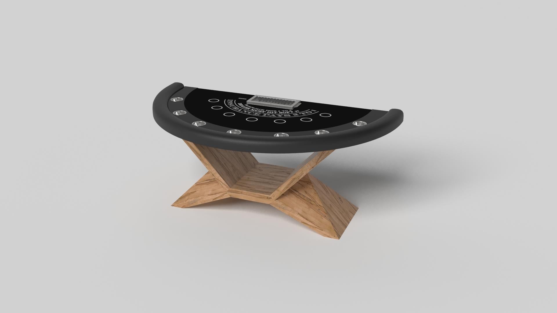 In chrome metal, the Kors blackjack table is a superior example of contrasting geometric forms. This table features an angular base that highlights the beauty of negative space from the front view. From the side view, it offers a completely