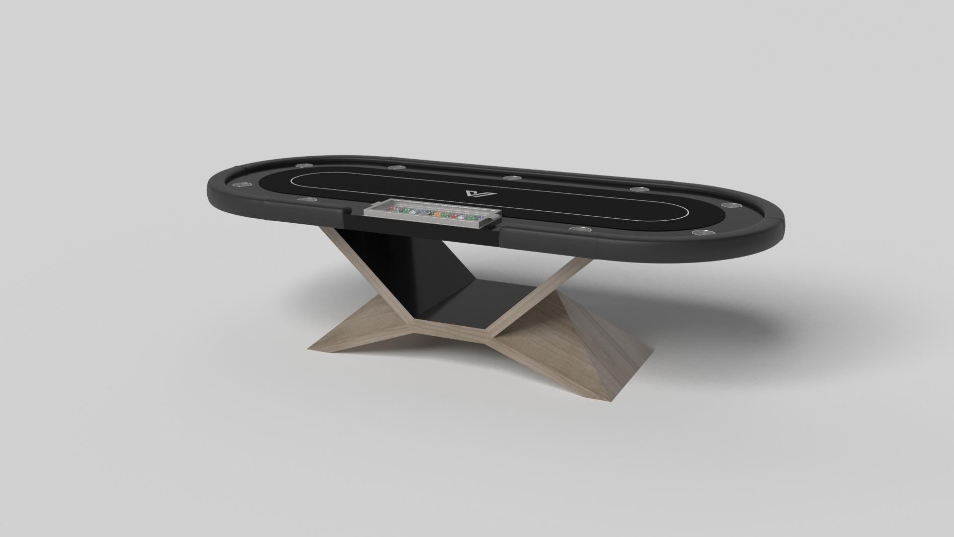 En cromo, la mesa de póquer Kors es un ejemplo superior de contraste de formas geométricas. Esta mesa presenta una base angular que resalta la belleza del espacio negativo desde la vista frontal. Desde la vista lateral, ofrece una perspectiva