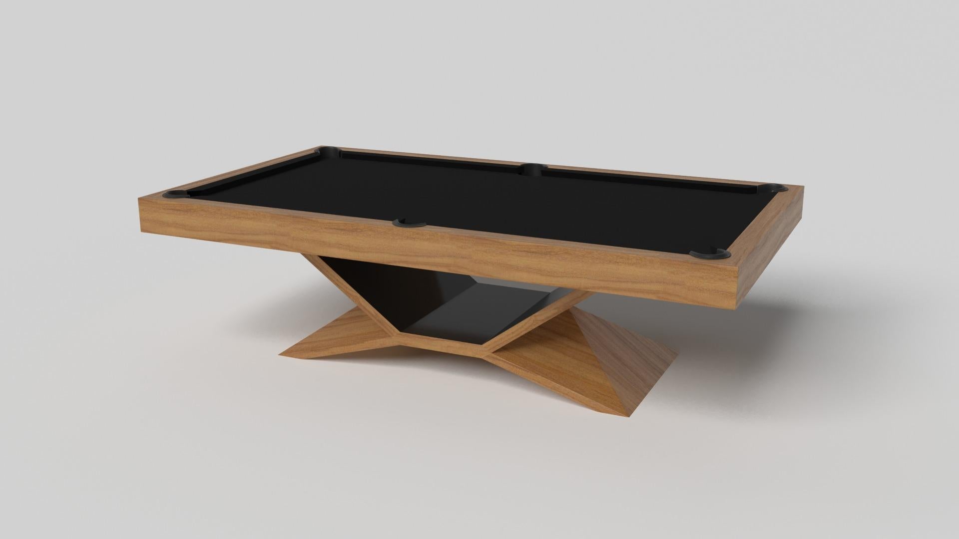 In chrome, the Kors pool table is a superior example of contrasting geometric forms. This table features an angular base that highlights the beauty of negative space from the front view. From the side view, it offers a completely different