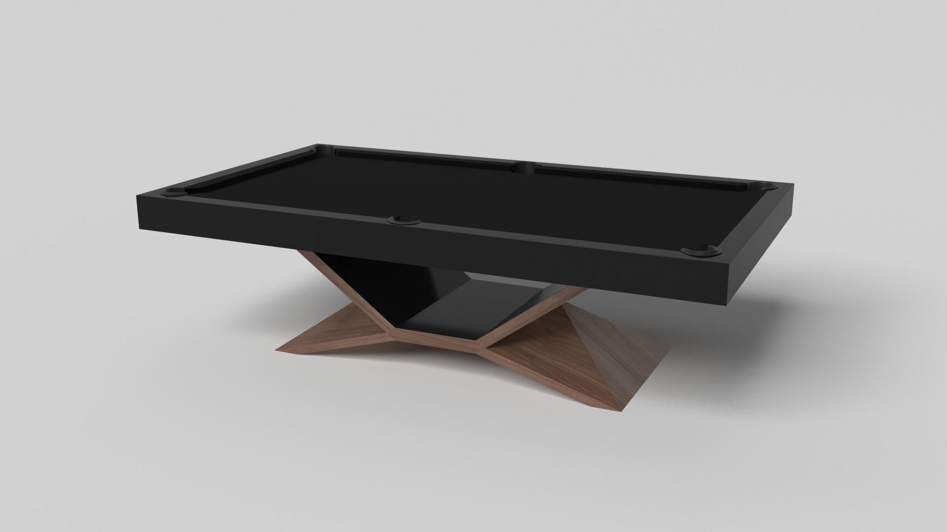 In chrome, the Kors pool table is a superior example of contrasting geometric forms. This table features an angular base that highlights the beauty of negative space from the front view. From the side view, it offers a completely different