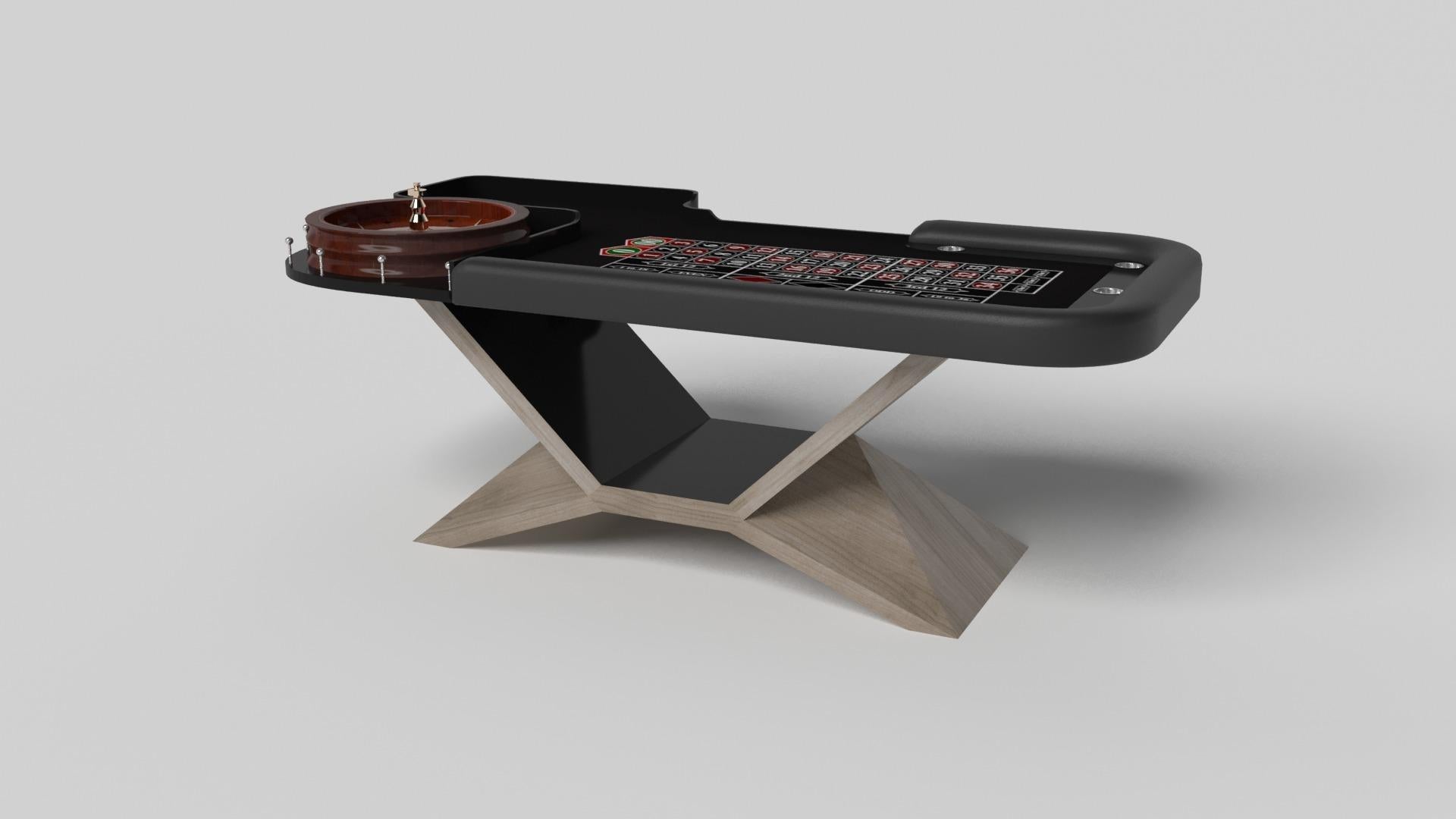 In chrome metal, the Kors roulette table is a superior example of contrasting geometric forms. This table features an angular base that highlights the beauty of negative space from the front view. From the side view, it offers a completely different