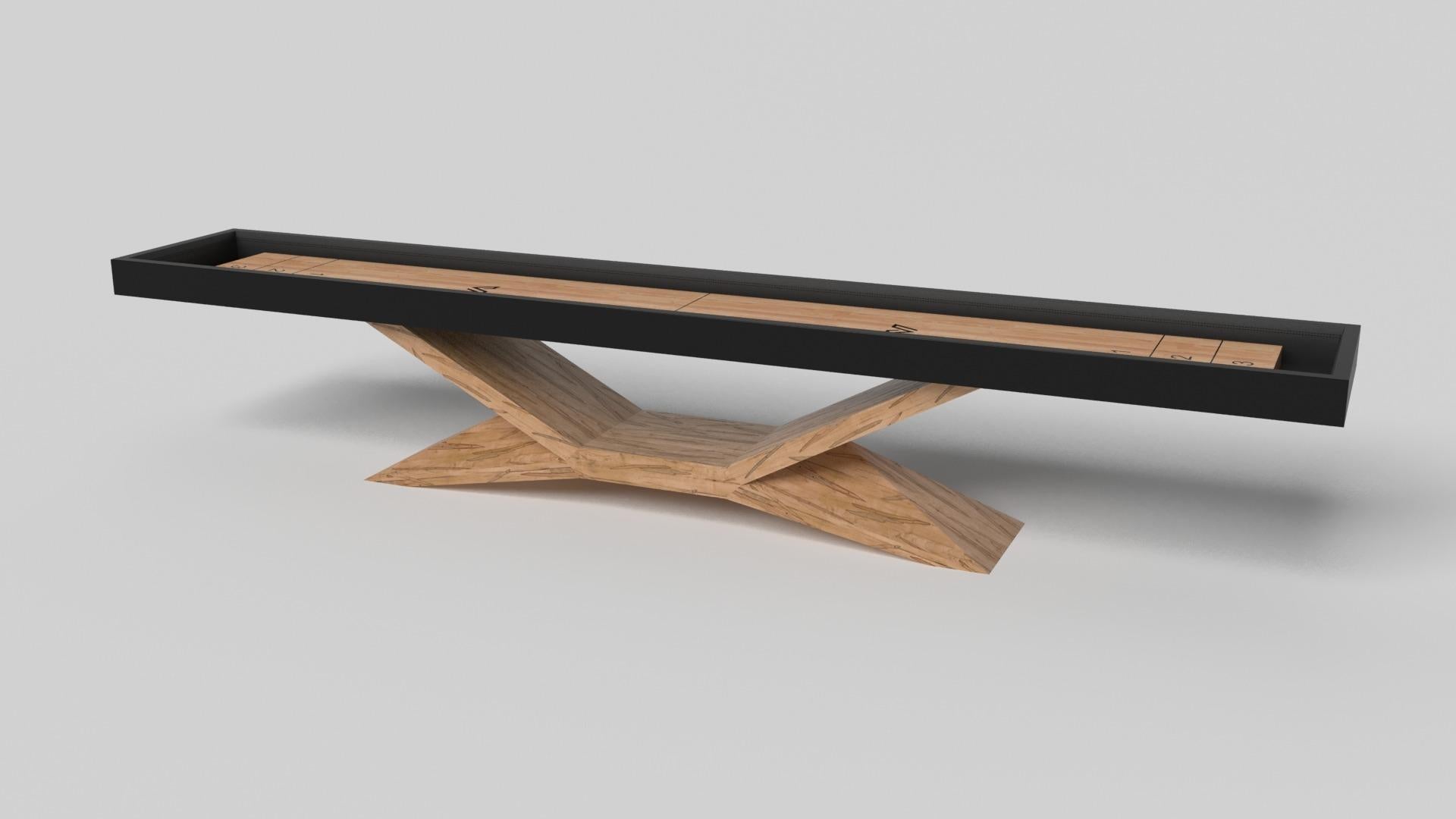 In chrome, the Kors shuffleboard table is a superior example of contrasting geometric forms. This table features an angular base that highlights the beauty of negative space from the front view. From the side view, it offers a completely different