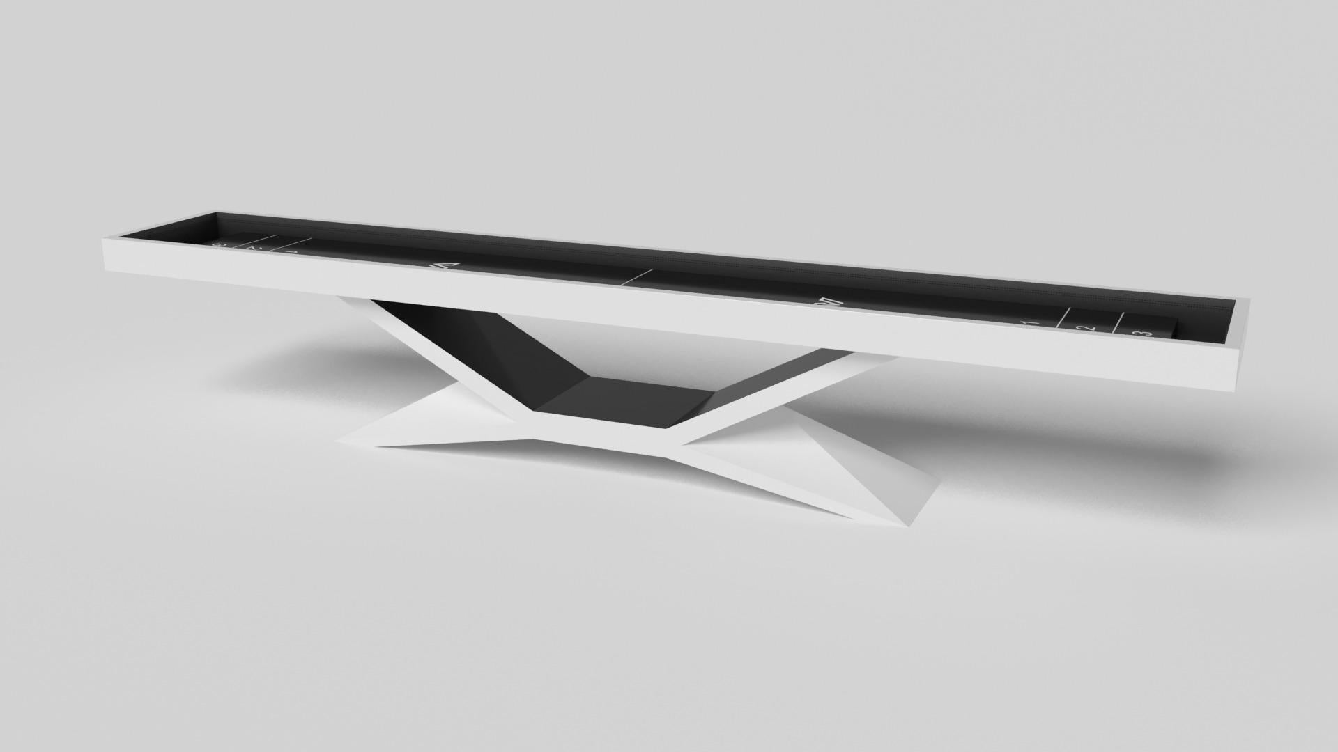 In chrome, the Kors shuffleboard table is a superior example of contrasting geometric forms. This table features an angular base that highlights the beauty of negative space from the front view. From the side view, it offers a completely different