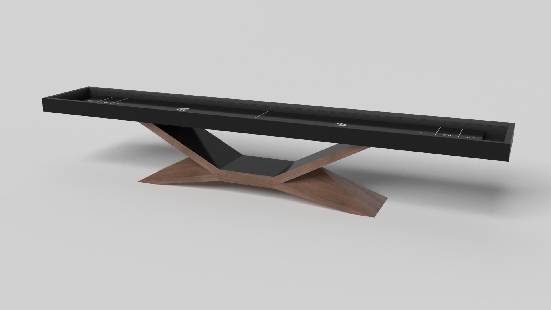 In chrome, the Kors shuffleboard table is a superior example of contrasting geometric forms. This table features an angular base that highlights the beauty of negative space from the front view. From the side view, it offers a completely different