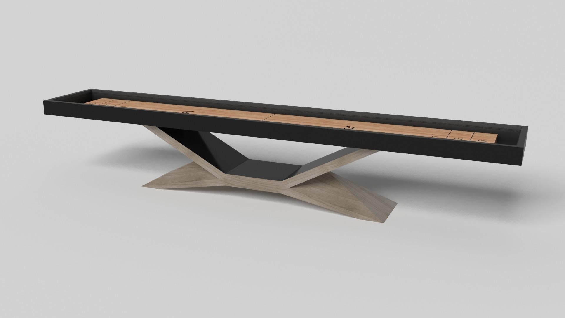In chrome, the Kors shuffleboard table is a superior example of contrasting geometric forms. This table features an angular base that highlights the beauty of negative space from the front view. From the side view, it offers a completely different