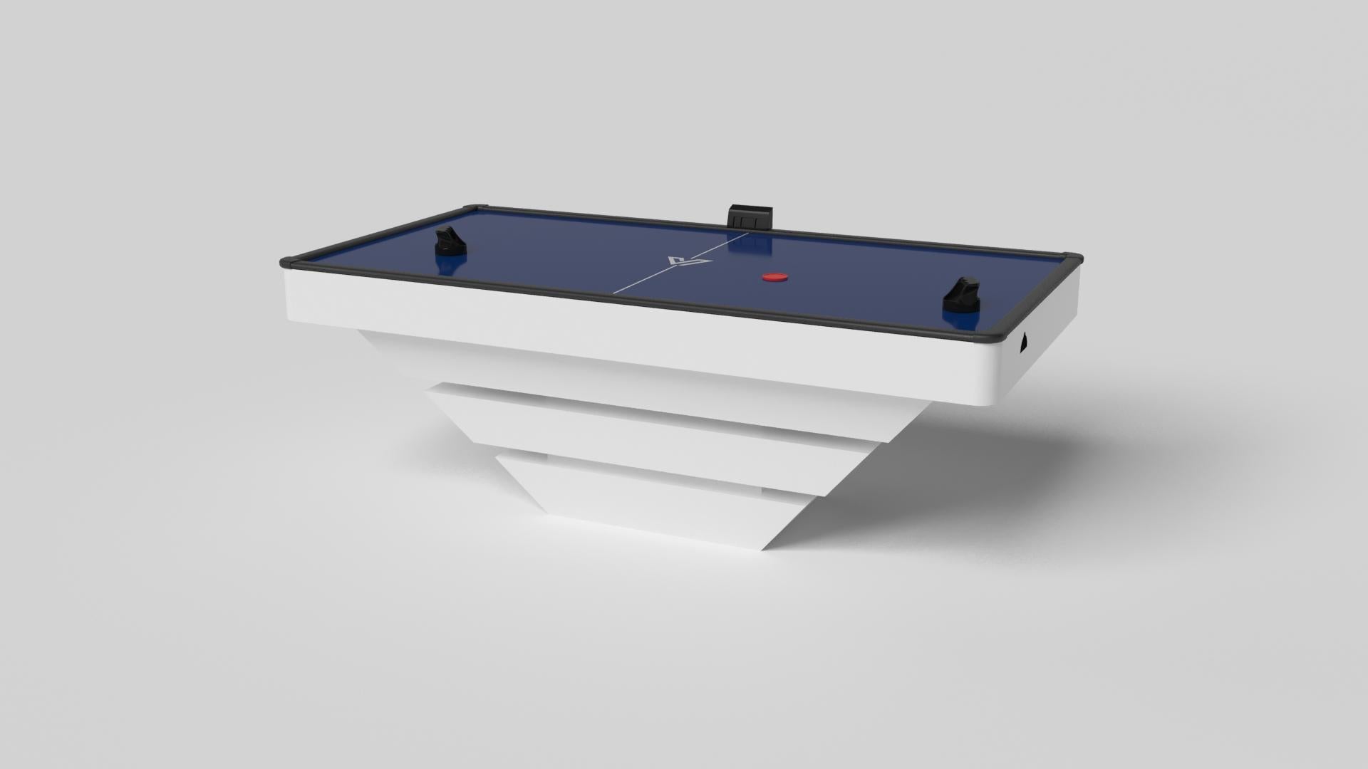 Three solid pieces of wood seemingly float around a concealed center base, making the Louve air hockey in chrome one of our most mind-bending designs. Crafted from solid metal, this contemporary table features a smooth finish with a tapered base