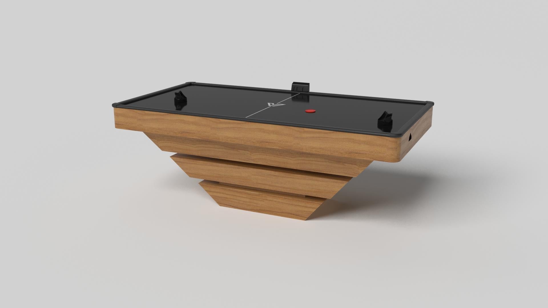 Trois pièces de bois massif semblent flotter autour d'une base centrale dissimulée, ce qui fait du hockey sur gazon Louve en chrome l'un de nos designs les plus étonnants. Fabriquée en métal massif, cette table contemporaine présente une finition