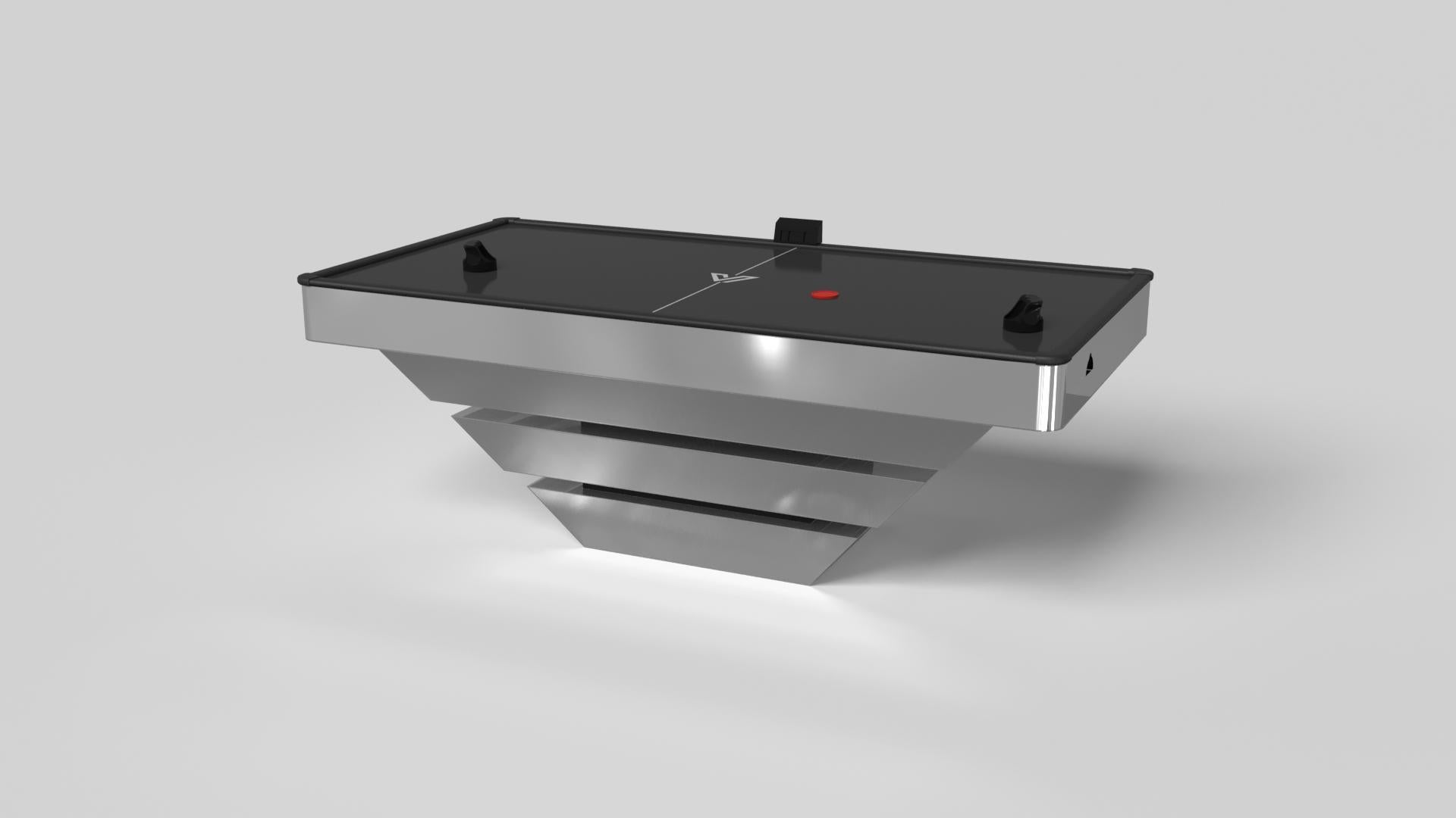 Tre solidi pezzi di legno sembrano fluttuare attorno a una base centrale nascosta, rendendo l'air hockey Louve cromato uno dei nostri design più sorprendenti. Realizzato in metallo massiccio, questo tavolo contemporaneo presenta una finitura liscia