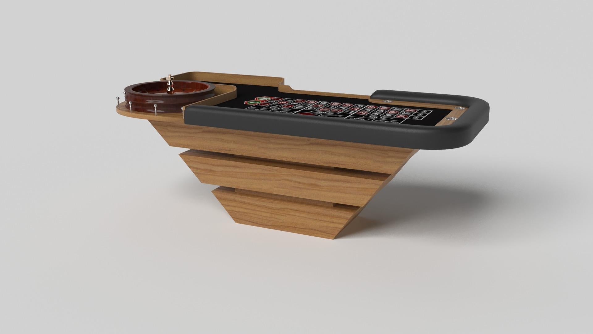 Three solid pieces of wood seemingly float around a concealed center base, making the Louve roulette table in chrome one of our most mind-bending designs. Crafted from solid metal and detailed with betting boxes and an American wheel, this