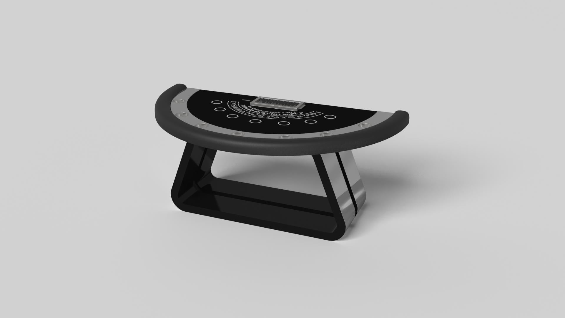 La table de blackjack Luge en noyer est dotée d'une base ouverte aux courbes généreuses et aux bords lisses qui lui confèrent une sensation de légèreté et d'aération. Évoquant la vitesse et l'esprit de mouvement continu, cette table de jeu exclusive