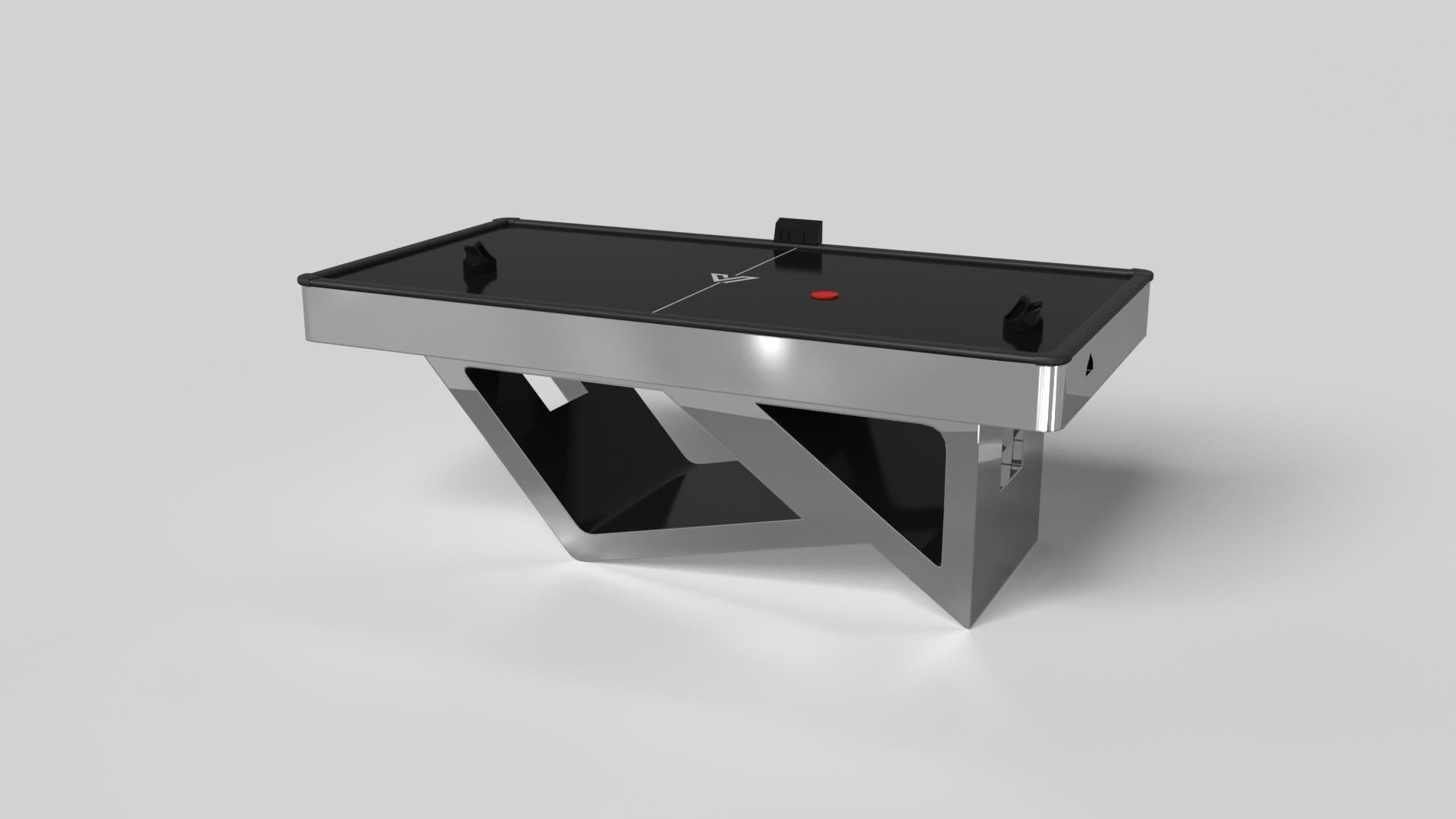 Ispirandosi alla bellezza delle forme geometriche, il tavolo da air hockey Rumba in alluminio spazzolato è caratterizzato da una serie di forme cave e solide che formano una base asimmetrica. Con un piano nero per giocare a livello professionale,