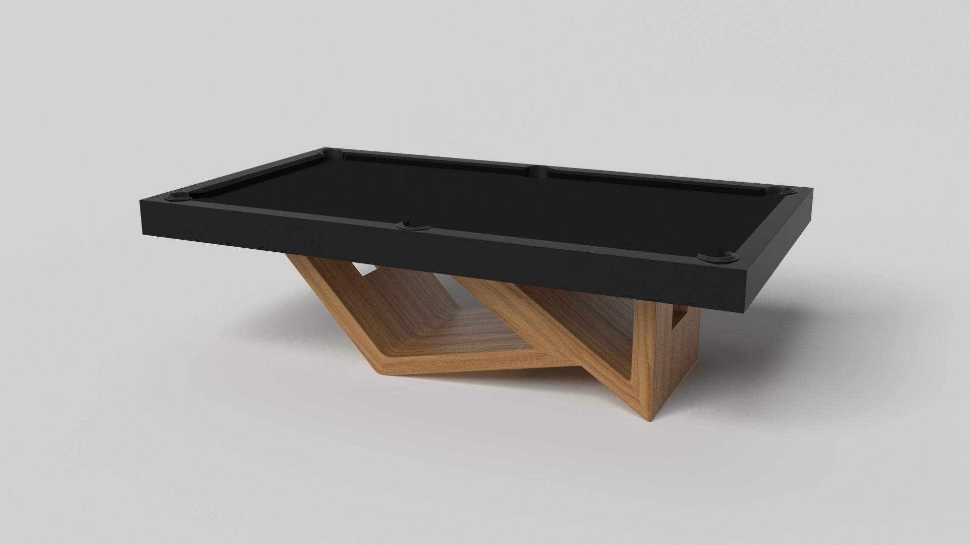 Drawing inspiration from the beauty of geometric forms, the Rumba pool table in brushed aluminum is characterized by a series of hollow and solid shapes that form an offset asymmetric base. Accented with a felt top for professional game play, this
