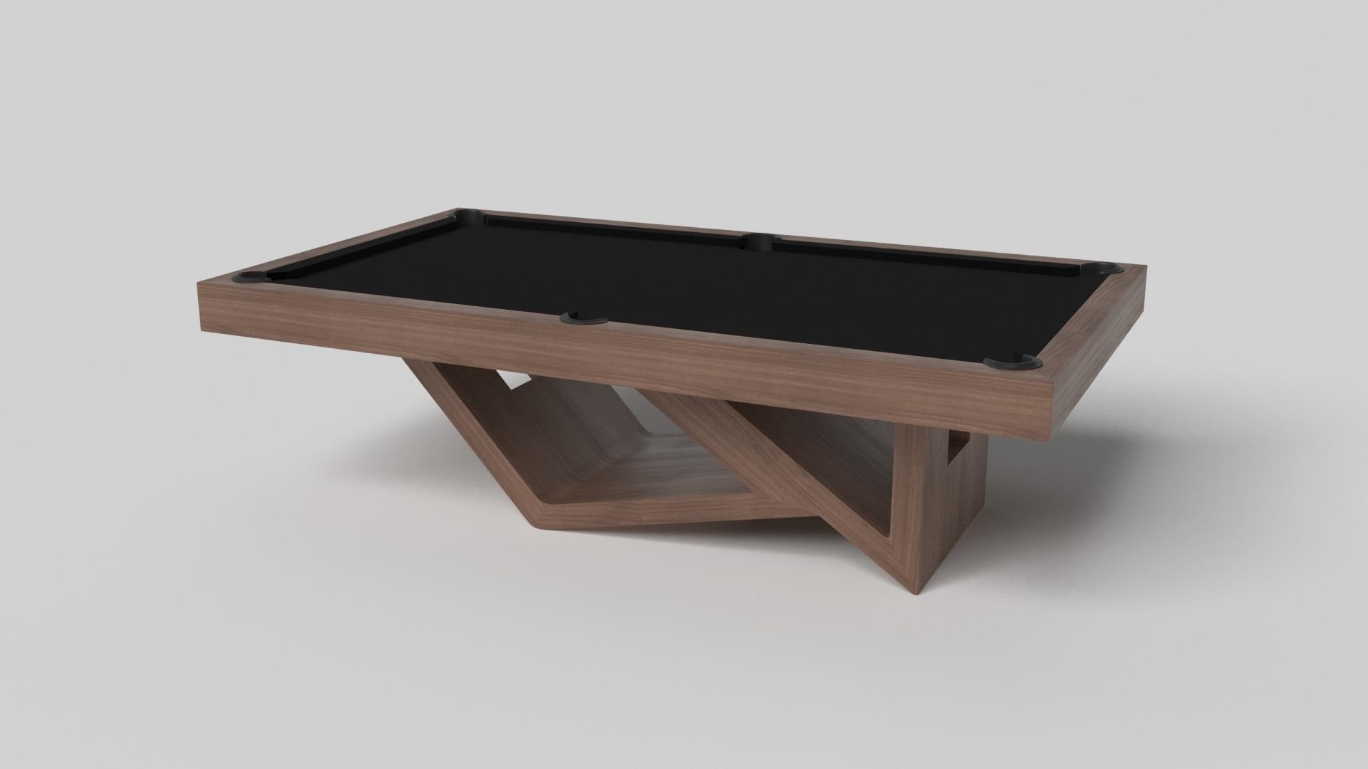 Drawing inspiration from the beauty of geometric forms, the Rumba pool table in brushed aluminum is characterized by a series of hollow and solid shapes that form an offset asymmetric base. Accented with a felt top for professional game play, this