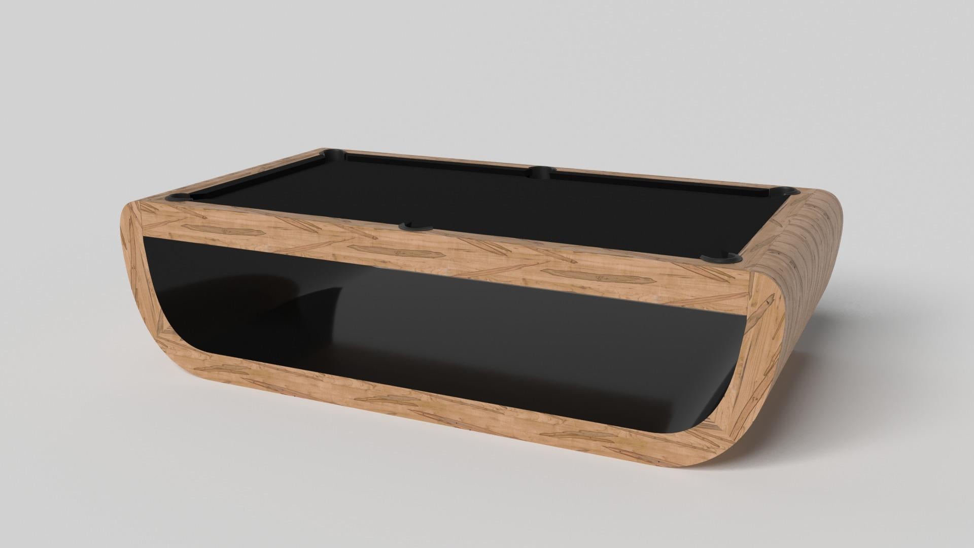 Handcrafted with intricate accents and a precision-carved curved base, the Sid pool table in black encompasses a series of smooth edges, distinctive details, and unconventional elements in one unique expression of luxury design. Built by hand from