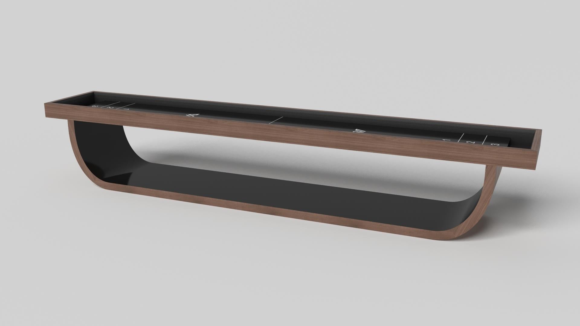 Handcrafted with intricate accents and a precision-carved curved base, the Sid shuffleboard table in black encompasses a series of smooth edges, distinctive details, and unconventional elements in one unique expression of luxury design. Built by