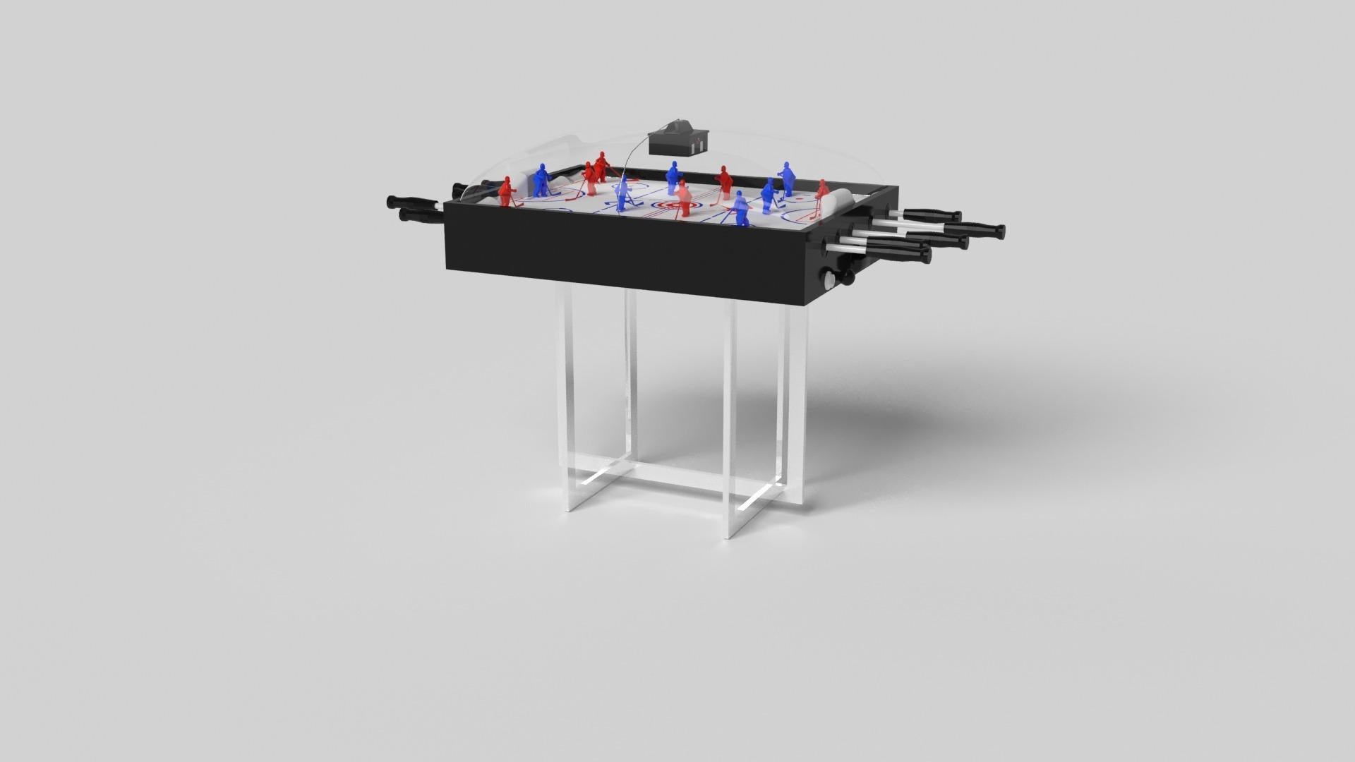 Avec une base ouverte en métal, notre table Beso est une expression unique de formes contemporaines et d'espace négatif. Cette table de hockey à dôme est fabriquée à la main par nos maîtres artisans avec une base rectangle dans rectangle qui reprend