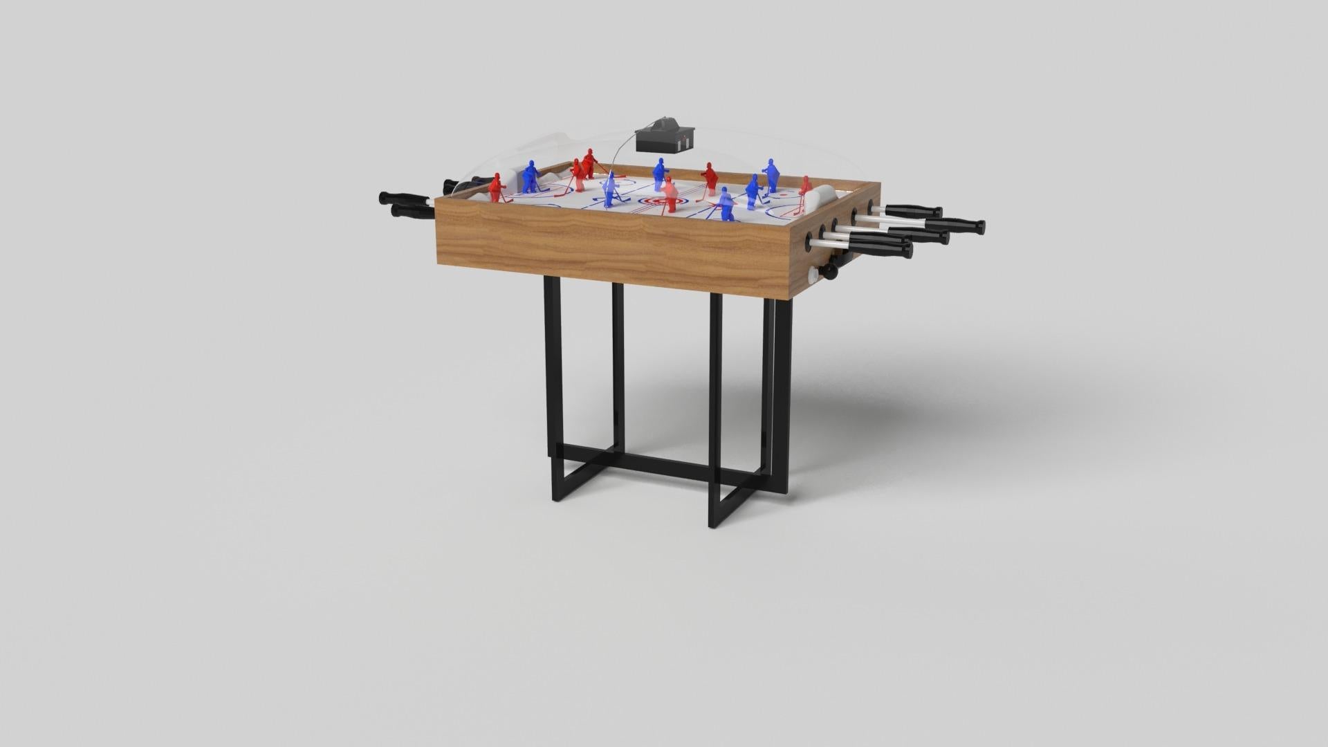 Avec une base ouverte en métal, notre table Beso est une expression unique de formes contemporaines et d'espace négatif. Cette table de hockey à dôme est fabriquée à la main par nos maîtres artisans avec une base rectangle dans rectangle qui reprend