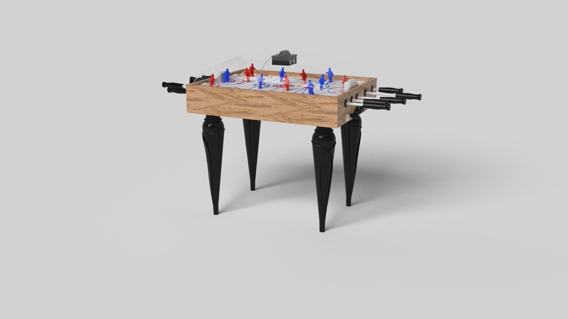 Champagne gold accents add undeniable elegance to this luxury dome hockey table. Offering superior playability and uncompromised style, this design features hand carved details, decorative metal elements, and metal sabots at the bottom of each leg.