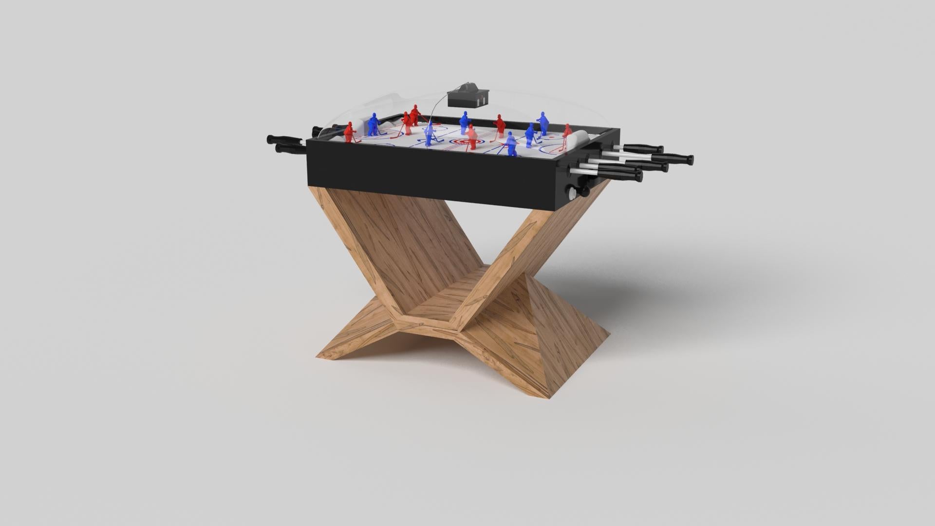 En chrome, la table de hockey Kors dome est un exemple supérieur de formes géométriques contrastées. Cette table présente une base angulaire qui met en valeur la beauté de l'espace négatif vu de face. Vu de côté, il offre une perspective