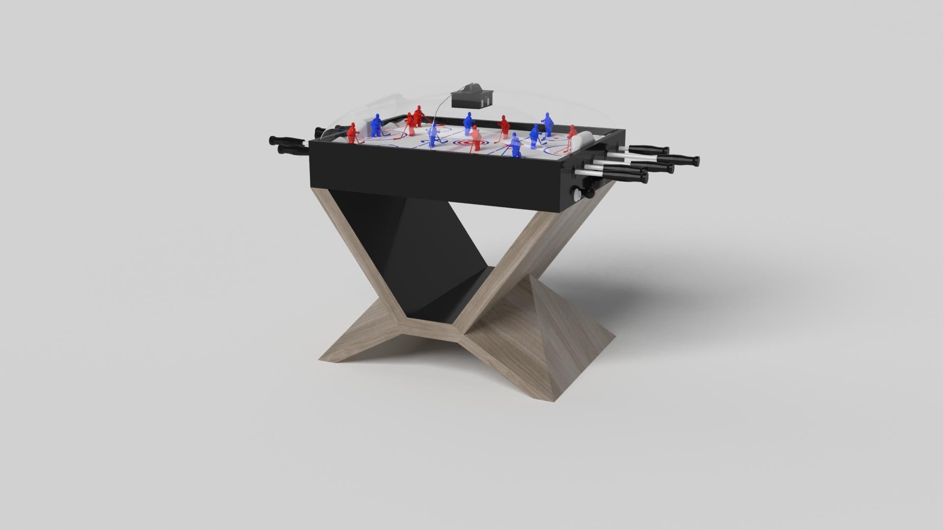 En cromo, la mesa de hockey de cúpula Kors es un ejemplo superior de contraste de formas geométricas. Esta mesa presenta una base angular que resalta la belleza del espacio negativo desde la vista frontal. Desde la vista lateral, ofrece una