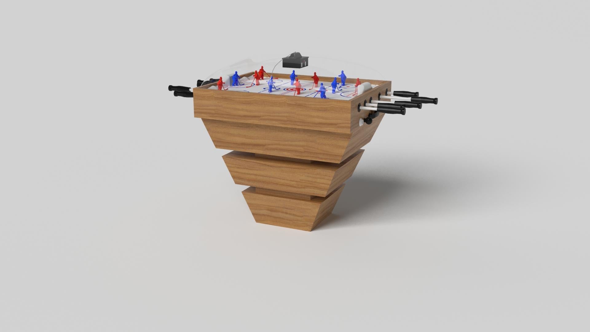 Three solid pieces of wood seemingly float around a concealed center base, making the Louve dome hockey table in chrome one of our most mind-bending designs. This contemporary game table features a smooth hand-sanded finish with a tapered base that