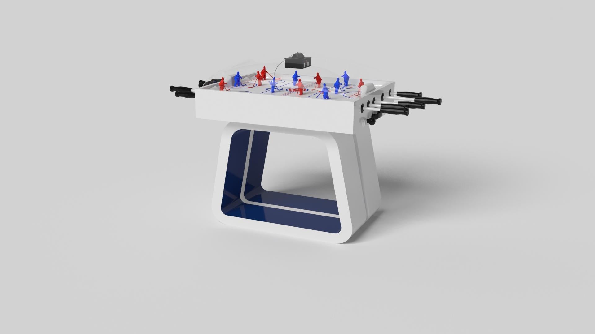 Une base ouverte avec des courbes et des bords lisses confère une sensation de légèreté et d'air à la table de hockey Luge dome en noyer. Évoquant la vitesse et l'esprit du mouvement continu, cette table de jeu exclusive se caractérise par une base