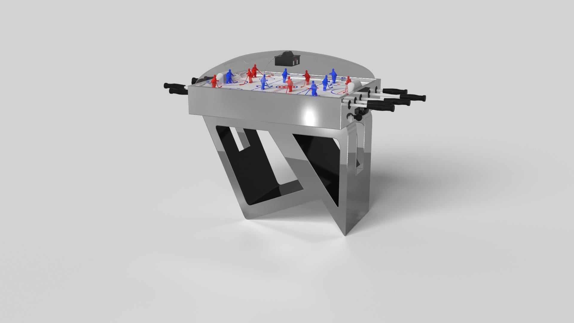Inspirándose en la belleza de las formas geométricas, la mesa de hockey Rumba de aluminio cepillado se caracteriza por una serie de formas huecas y sólidas que forman una base asimétrica compensada. Esta mesa a medida tiene un diseño de alta gama