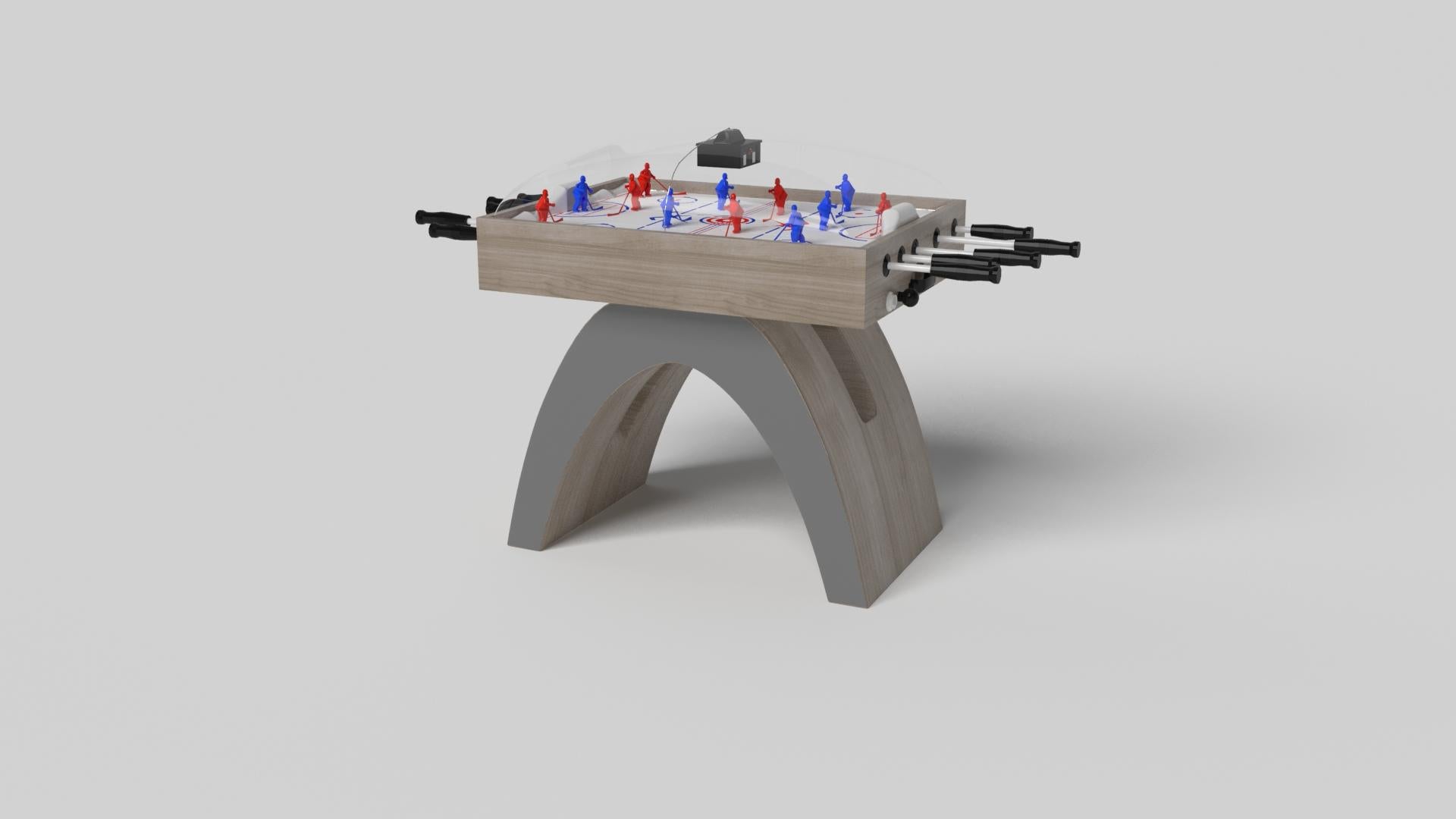 Una base abierta y arqueada se equilibra maravillosamente con los bordes duros de la superficie rectangular superior, haciendo de la mesa de ping-pong Zenith en negro y rojo una llamativa yuxtaposición de formas modernas y geométricas. Minimalista