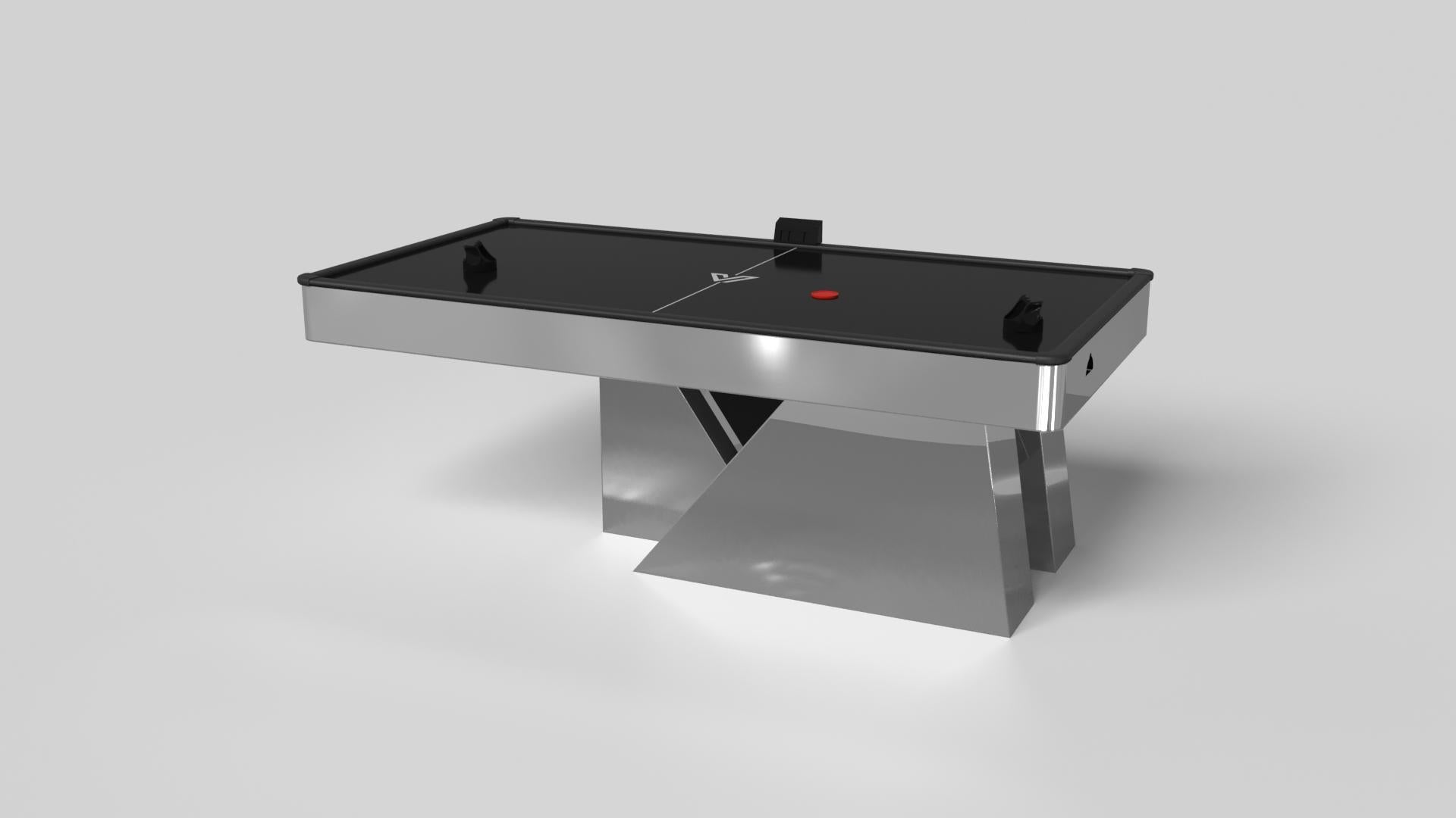 An asymmetric base creates a free-floating silhouette, making the Stilt air hockey table in chrome with walnut a compelling, contemporary addition to the modern home. Crafted from durable metal with solid walnut wood accents, this luxury handcrafted