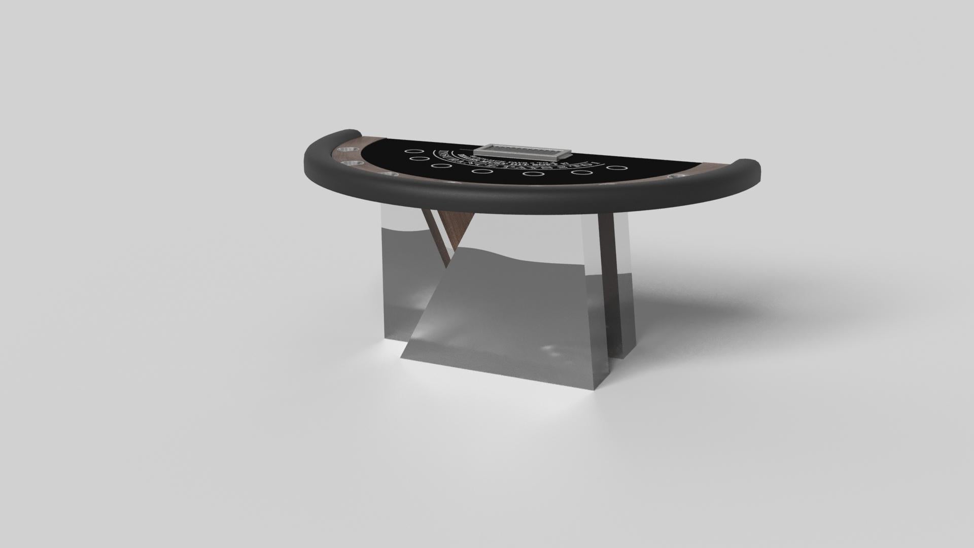 An asymmetric base creates a free-floating silhouette, making the Stilt blackjack table in walnut a compelling, contemporary addition to the modern home. Detailed with a chip rack and betting circles, this luxury handcrafted game table boasts an