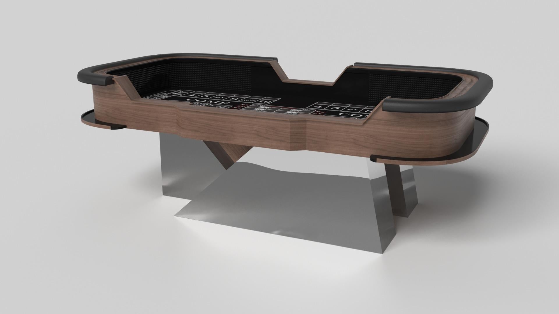 An asymmetric base creates a free-floating silhouette, making the Stilt craps table in walnut a compelling, contemporary addition to the modern home. Detailed with point boxes and betting blocks, this luxury handcrafted game table boasts an