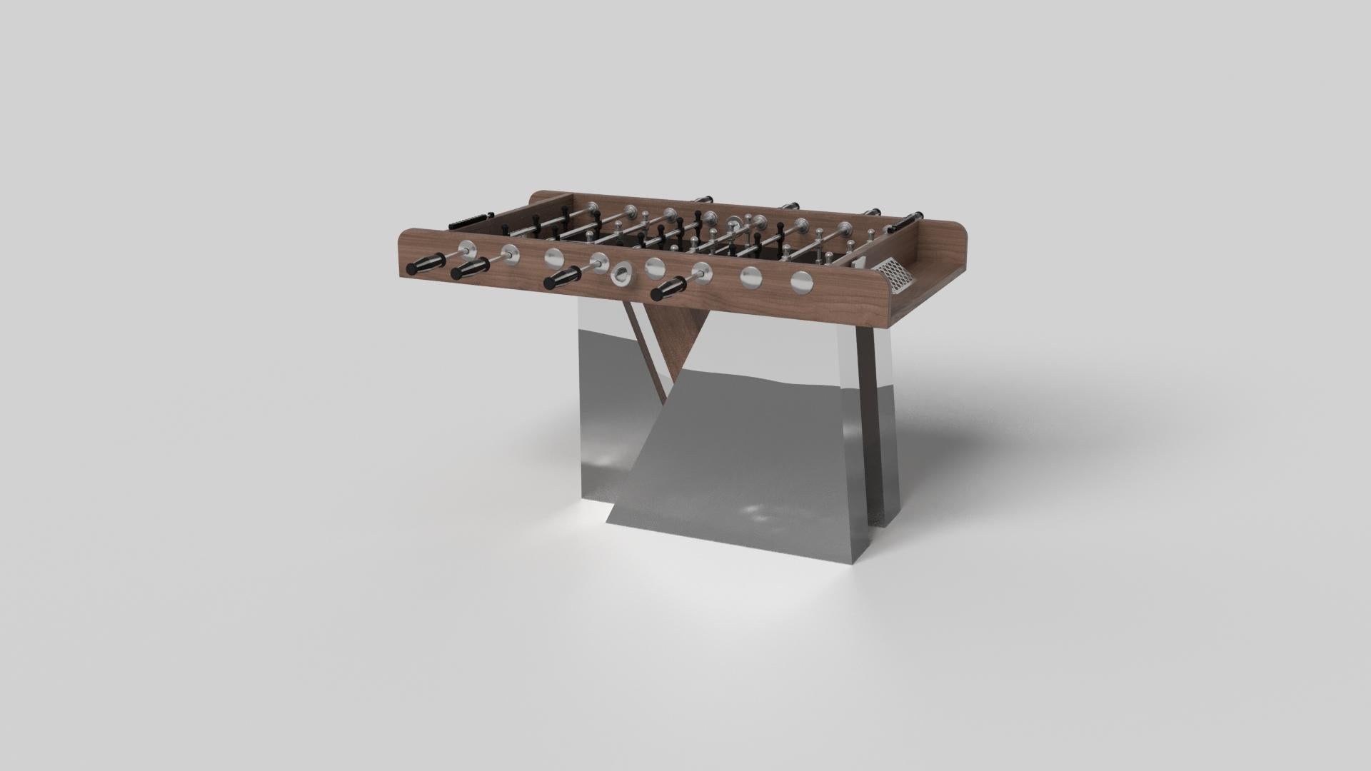 An asymmetric base creates a free-floating silhouette, making the Stilt foosball table in chrome with walnut a compelling, contemporary addition to the modern home. Crafted from durable metal with solid walnut wood accents, this luxury handcrafted