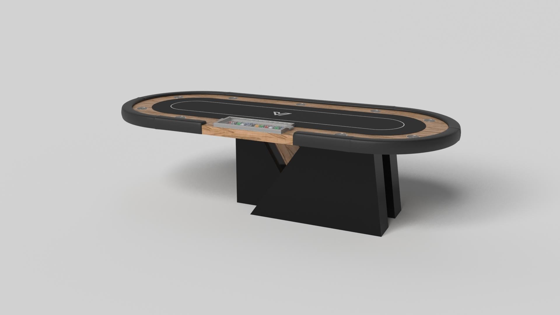 An asymmetric base creates a free-floating silhouette, making the Stilt poker table in chrome with walnut a compelling, contemporary addition to the modern home. Crafted from durable metal with solid walnut wood accents, this luxury handcrafted game