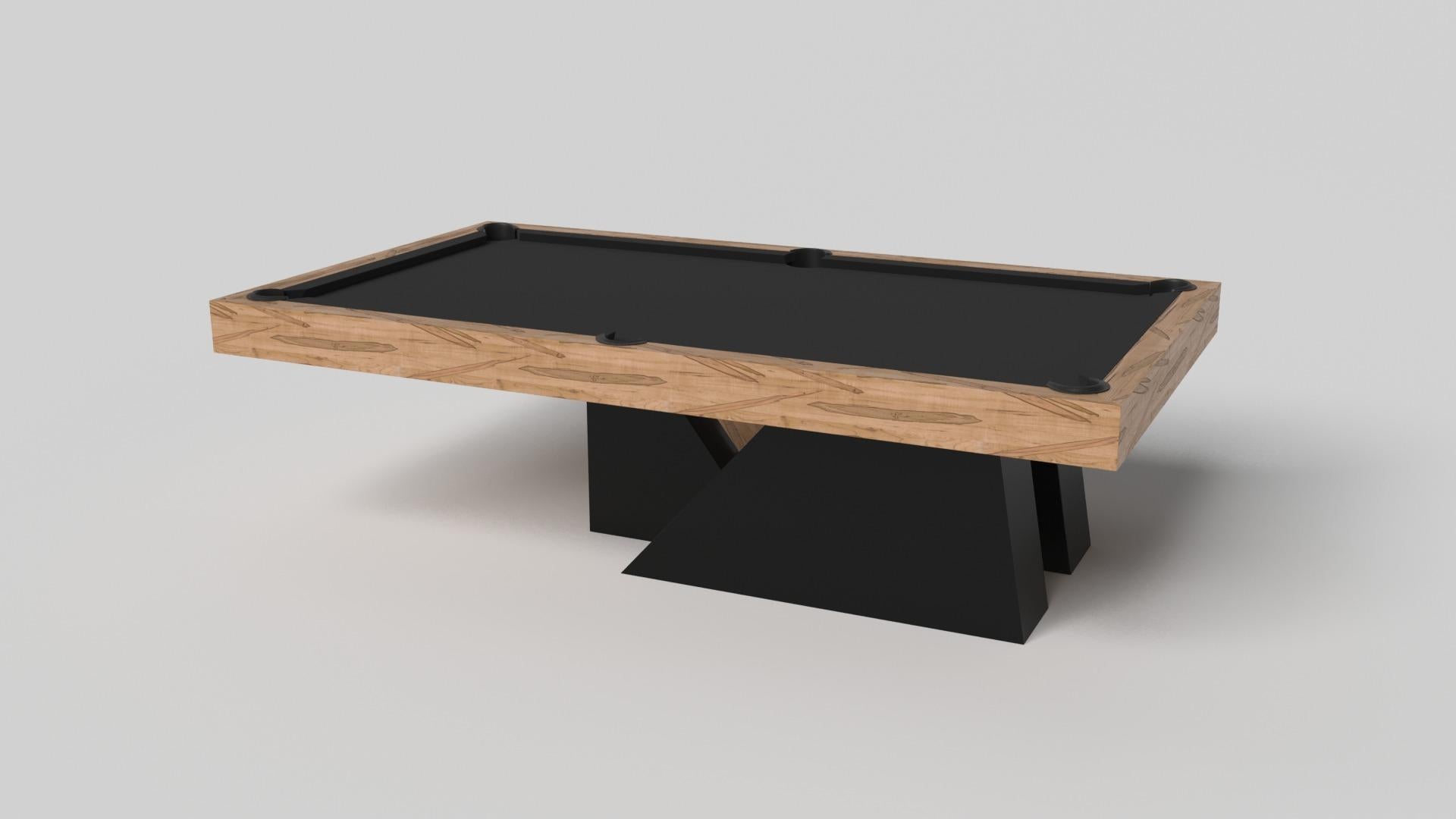 An asymmetric base creates a free-floating silhouette, making the Stilt pool table in chrome with walnut a compelling, contemporary addition to the modern home. Crafted from durable metal with solid walnut wood accents, this luxury handcrafted game