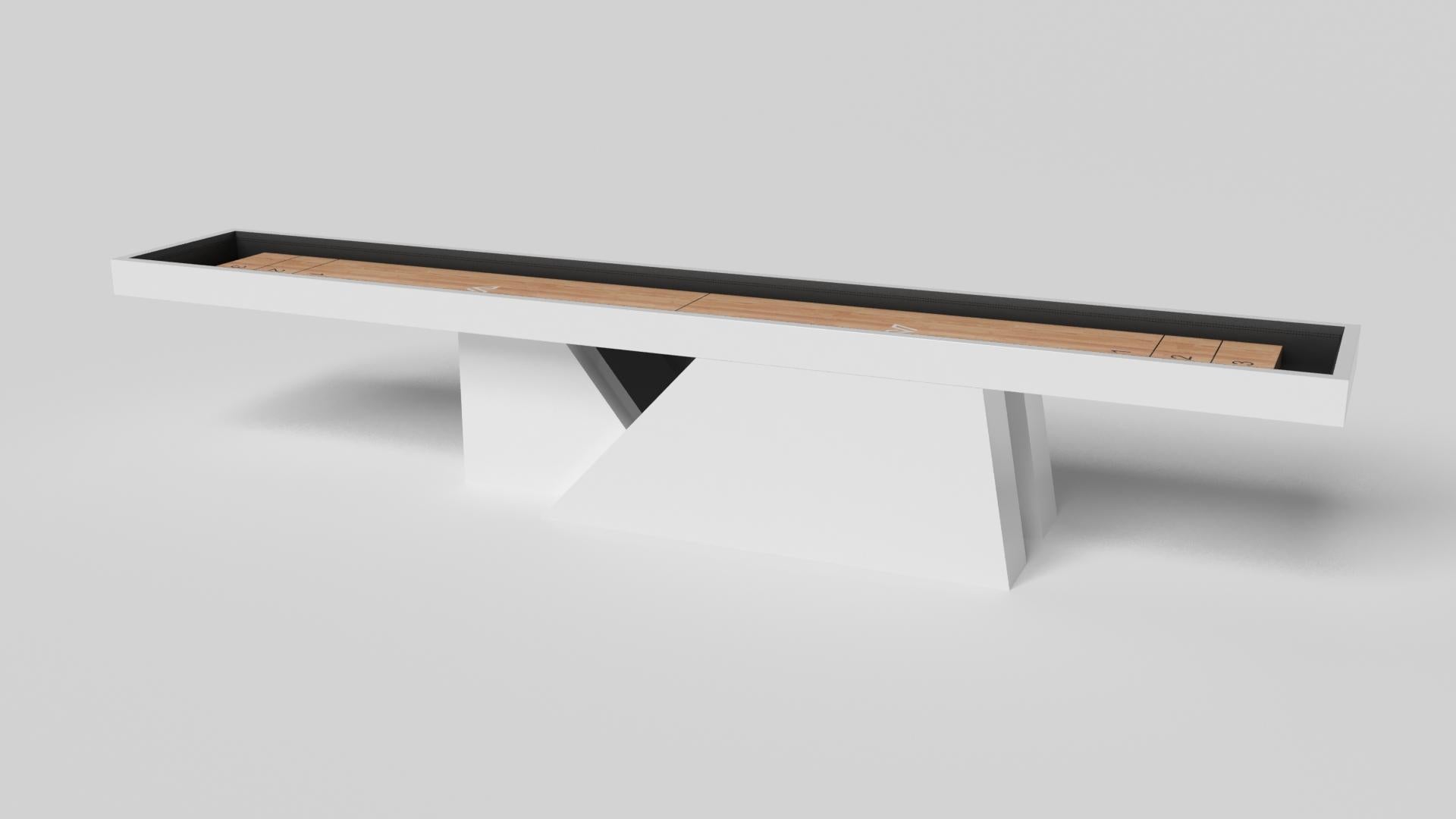 An asymmetric base creates a free-floating silhouette, making the Stilt shuffleboard table in chrome with walnut a compelling, contemporary addition to the modern home. Crafted from durable metal with solid walnut wood accents, this luxury